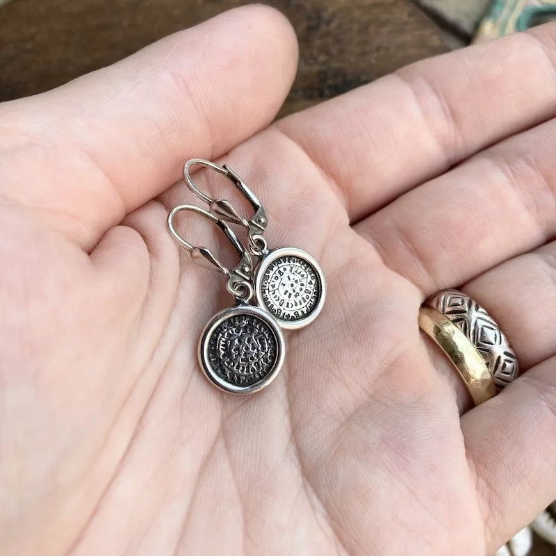 vintage sterling silver phaistos disc earrings 1.jpeg
