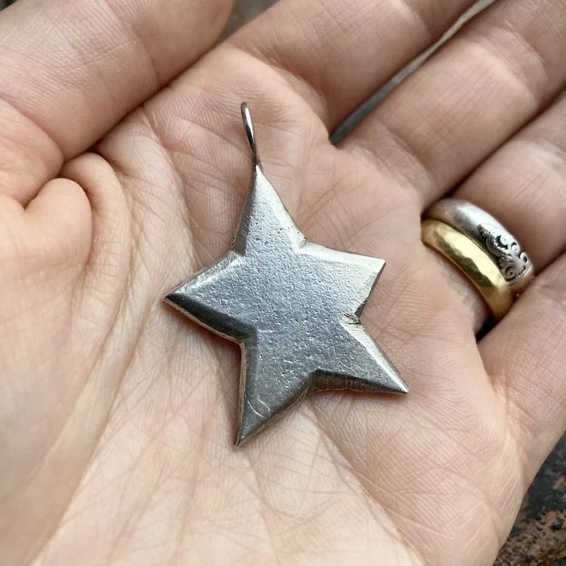 funky solid silver star pendant 3.jpeg