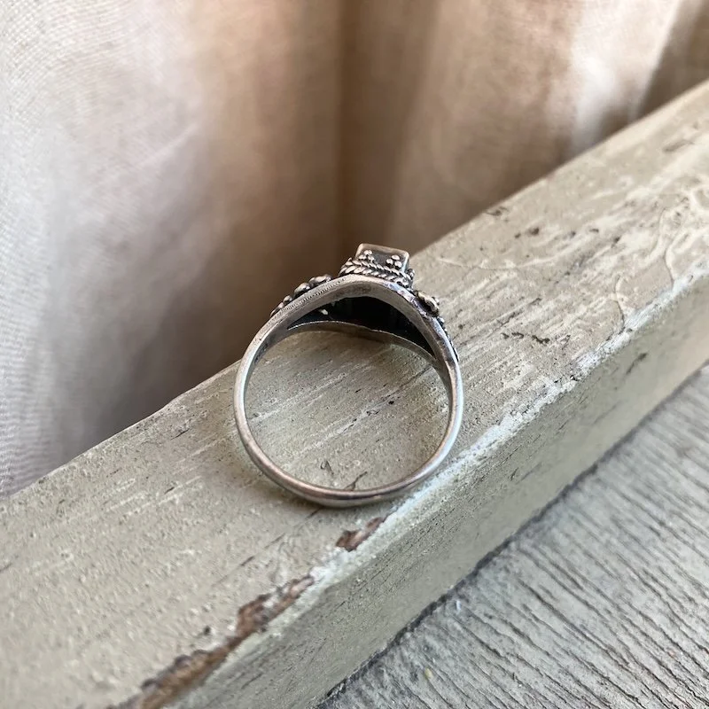 ornate sterling silver and garnet ring 4.jpeg