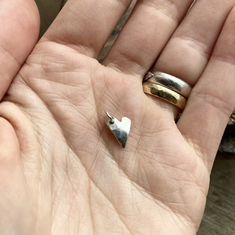 tiny sterling silver heart pendant 3.jpeg