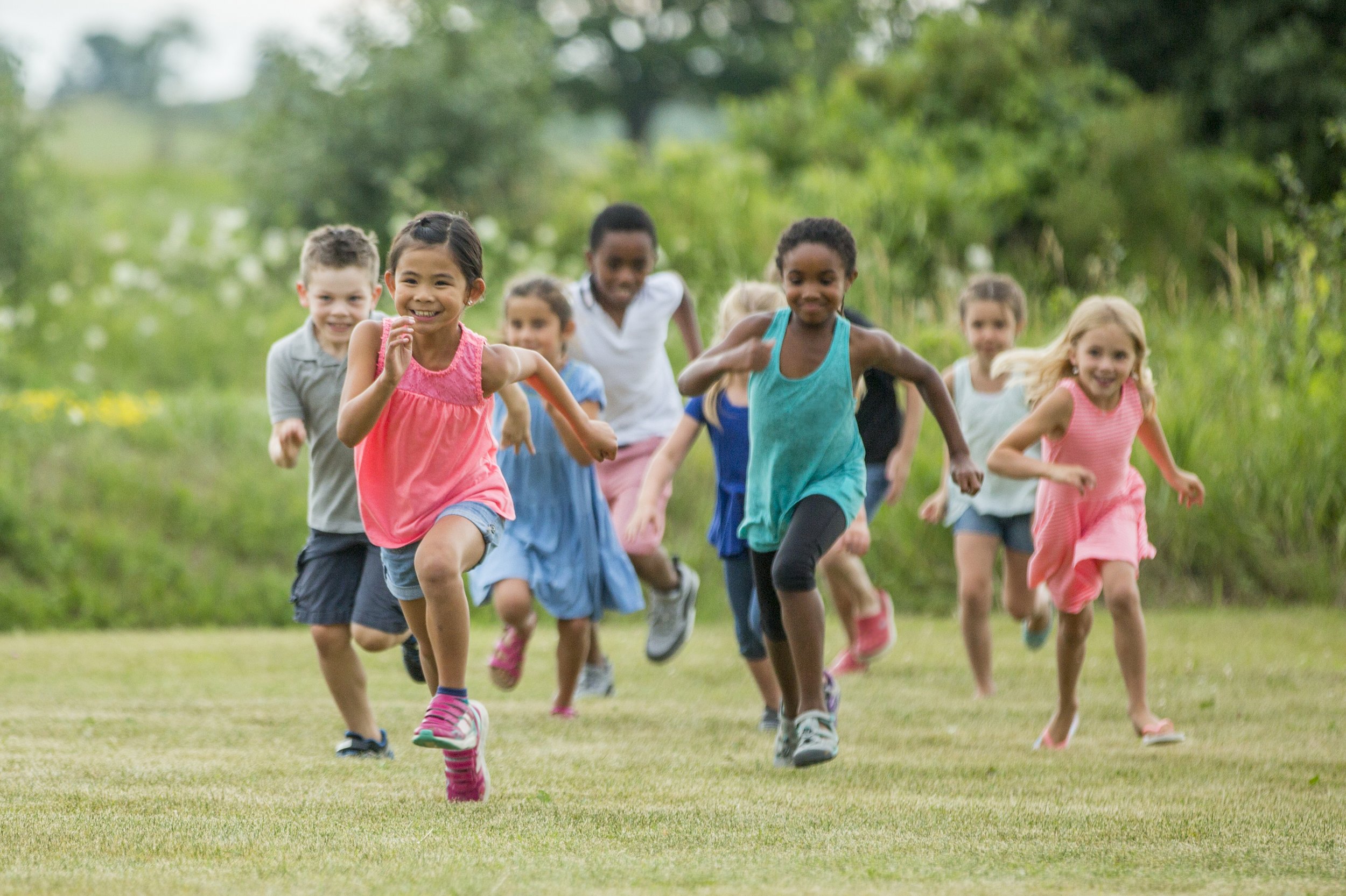 summer camp explorers playing outside