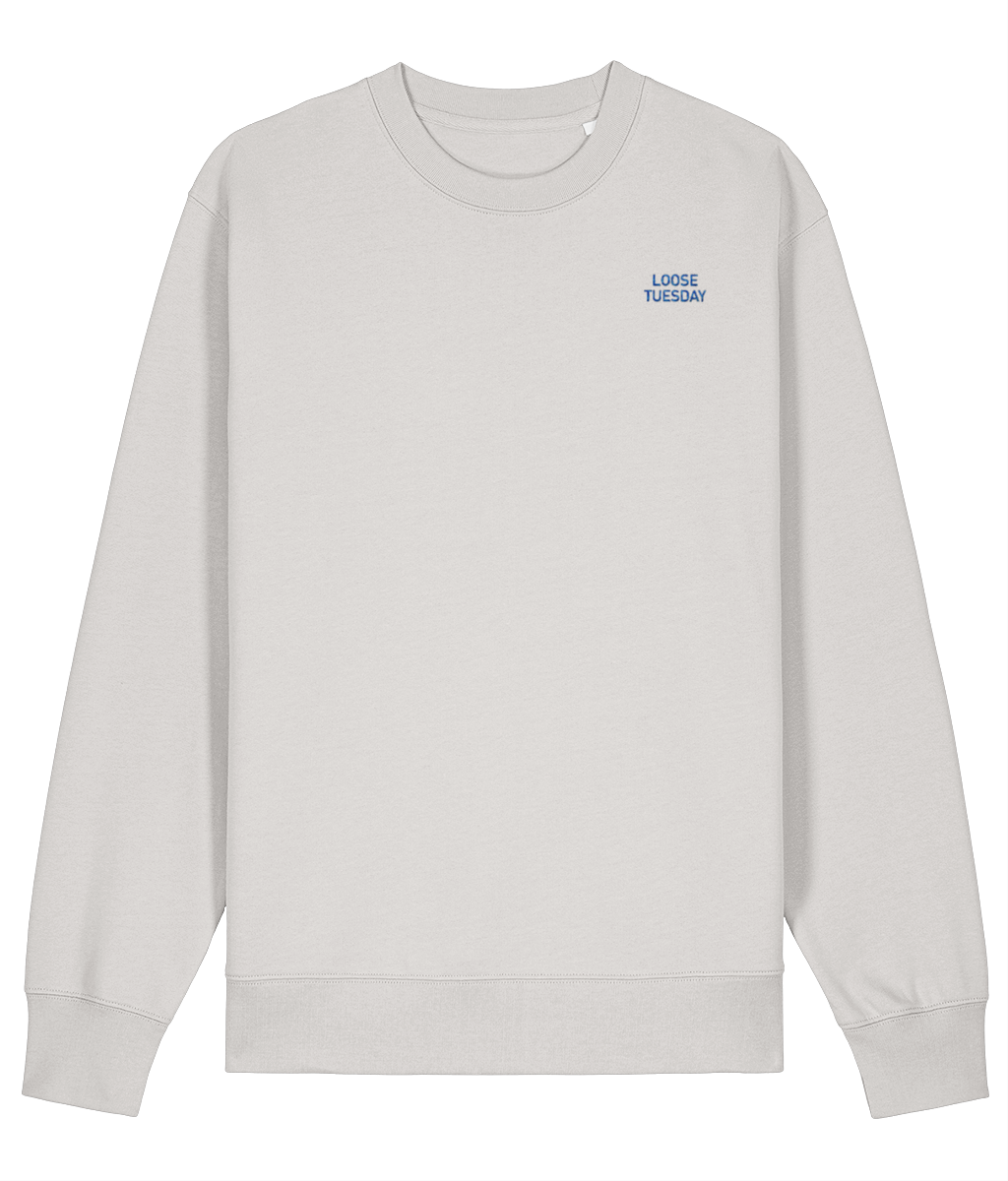 Loose Tuesday Headland Sweater — front view, small chest embroidery on off-white