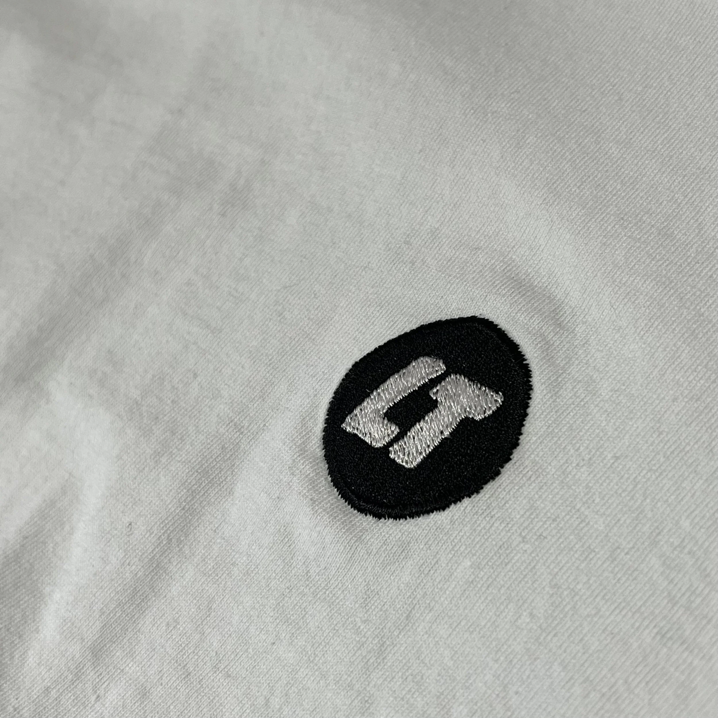 Everyday t-shirt in white with small chest logo and large back print — Loose Tuesday