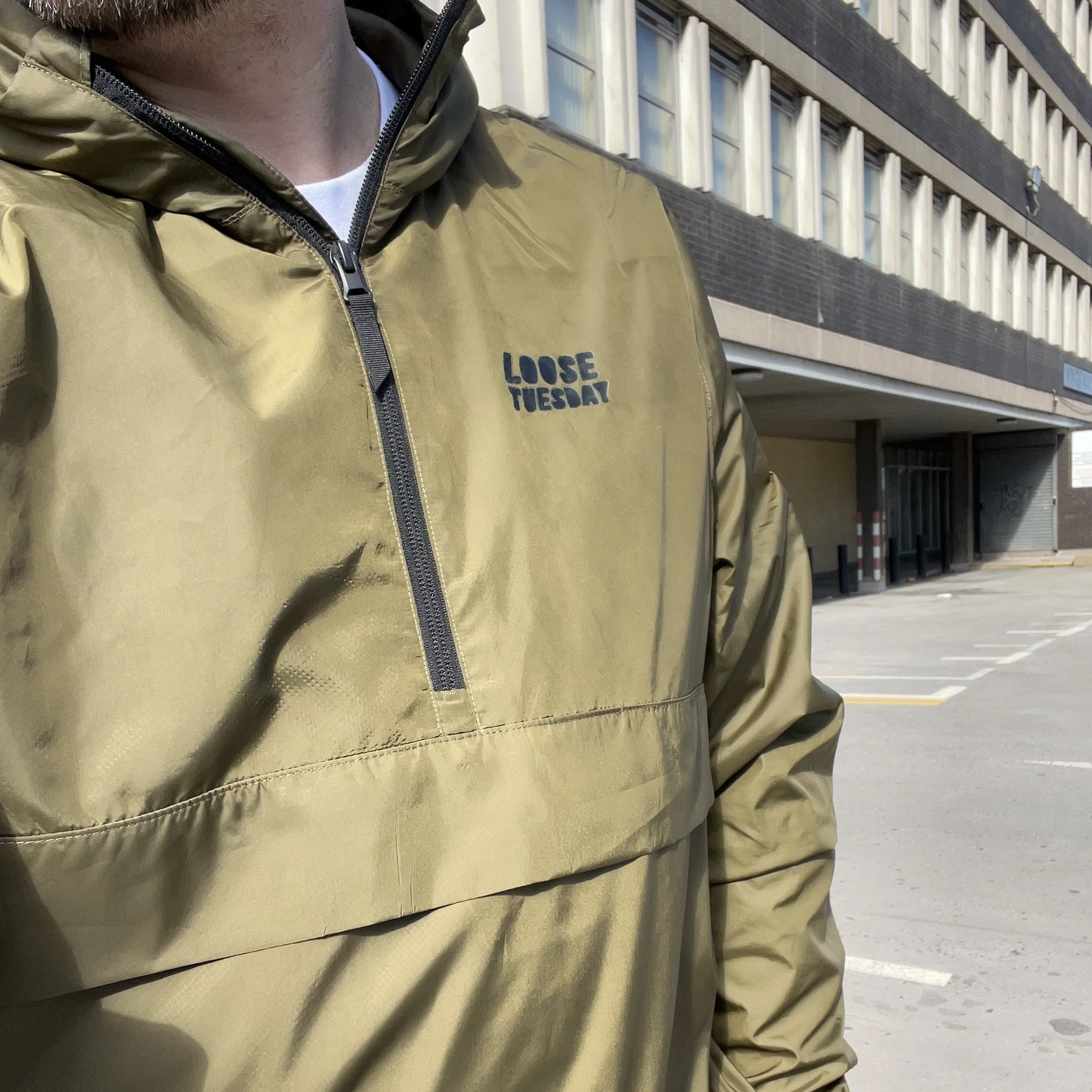 Shelter pullover in british khaki with hand-drawn chest logo — Loose Tuesday