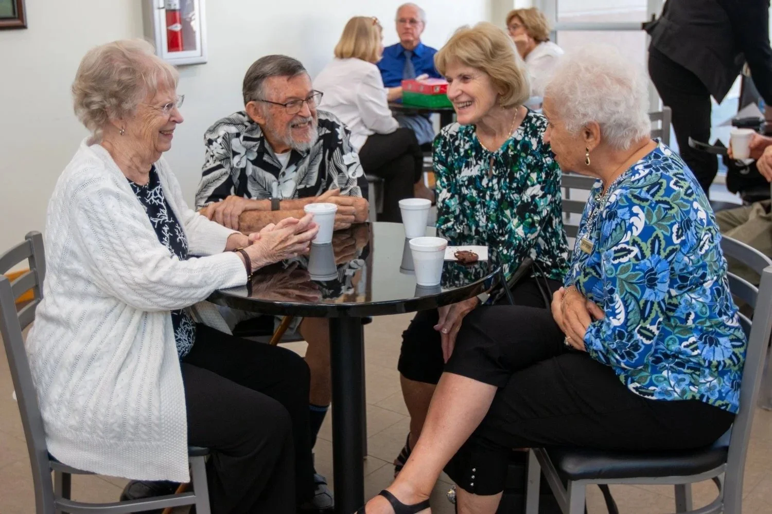 North Lake members talking together around a table