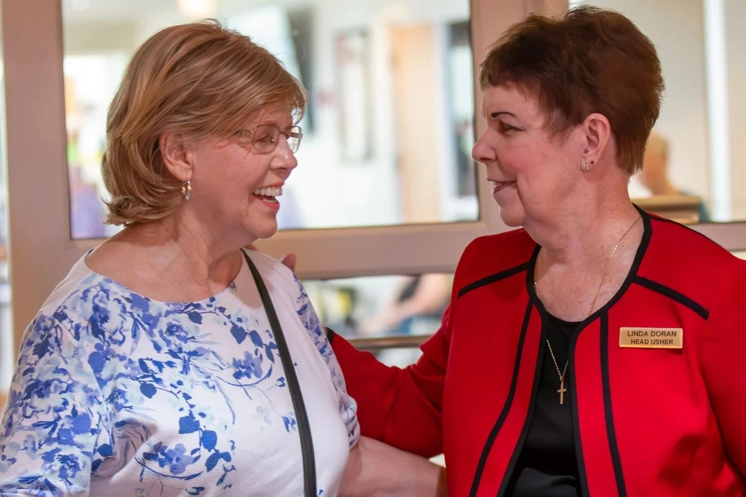 Two women from North Lake sharing a caring conversation