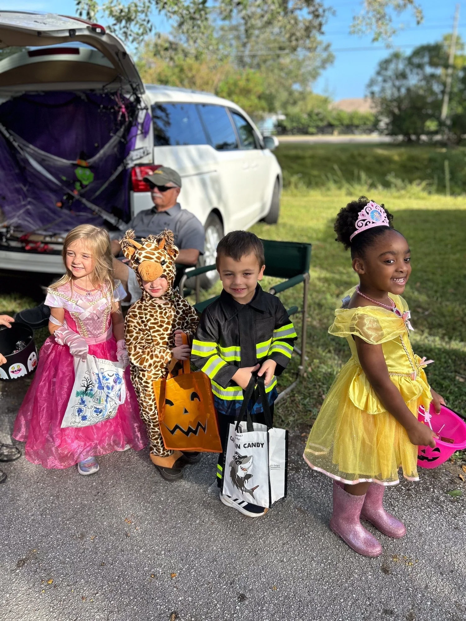 Little Blessings children in costumes at a fall trunk-or-treat