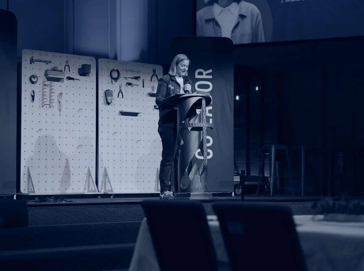 Corinne Nelson speaking at a Co-Labor event