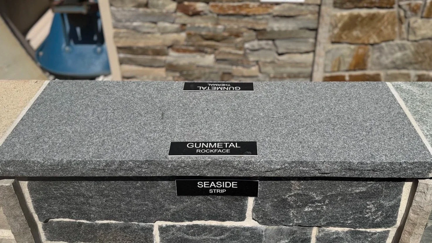 GUNMETAL GRANITE W/ ROCKFACE EDGE