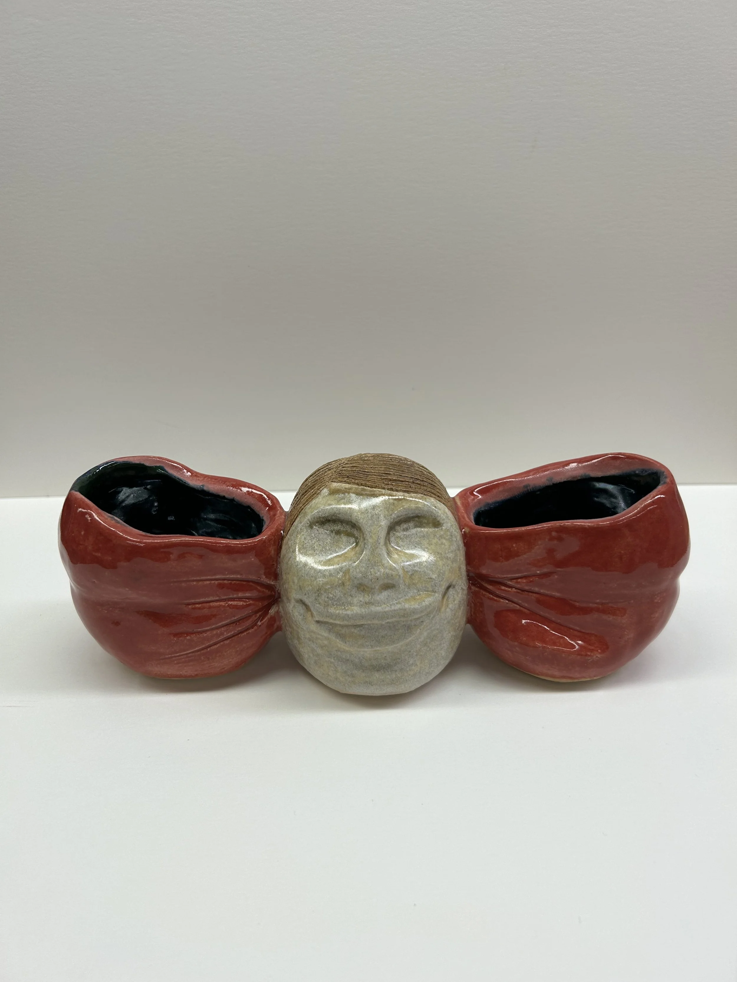 “She’s a bow!” Terracotta, 2024.