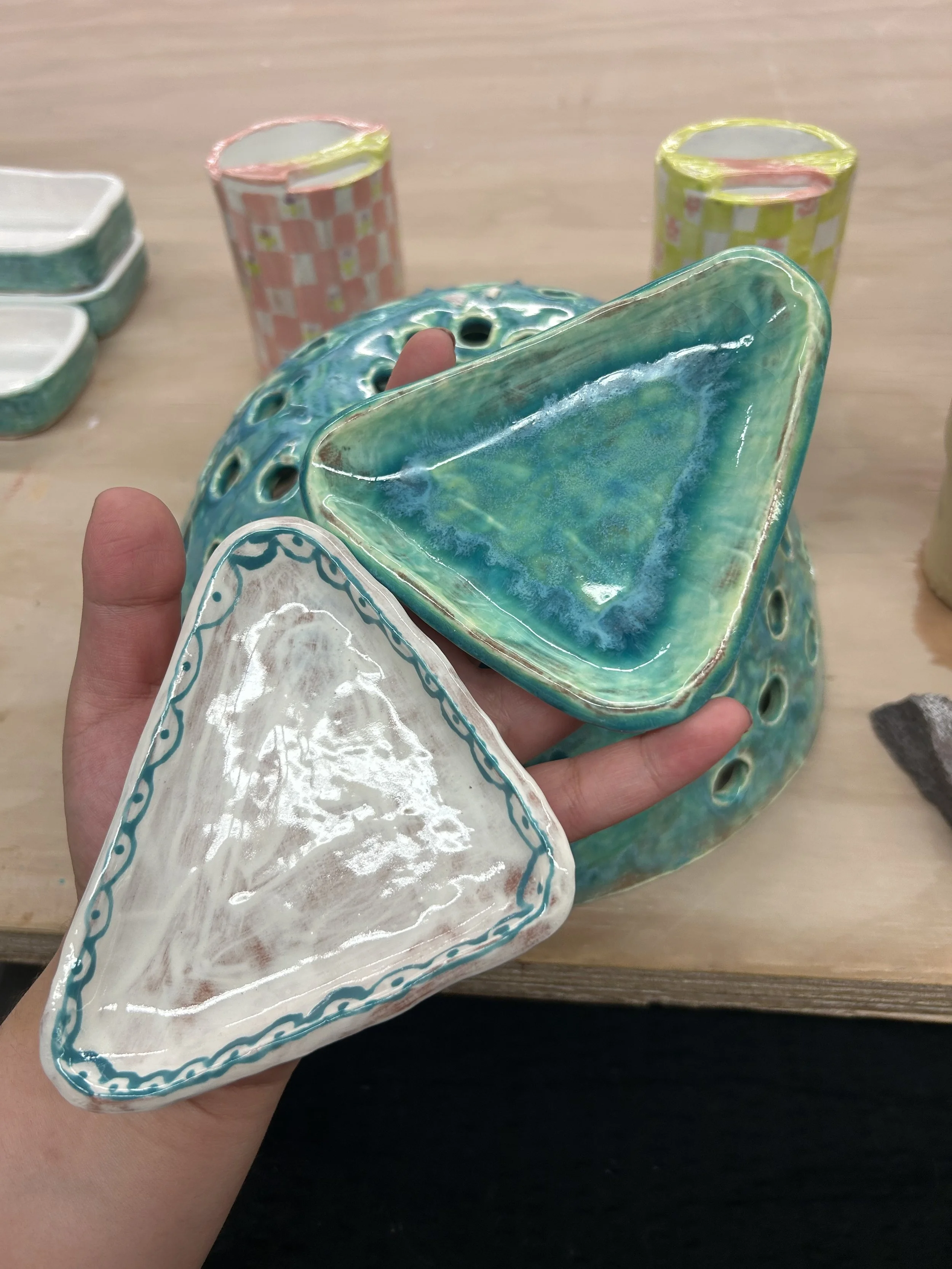 Triangle dishes, terracotta, 2024.