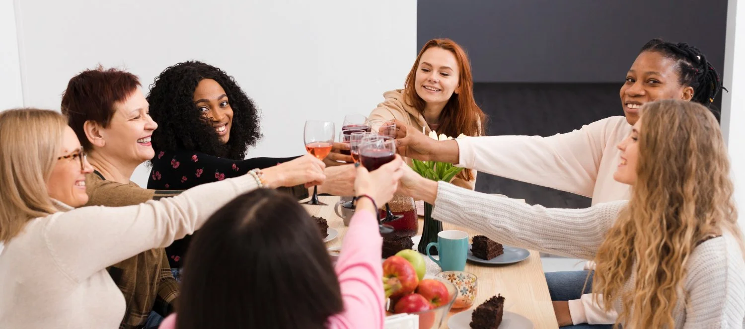 Women gathered and participating in a giving circle