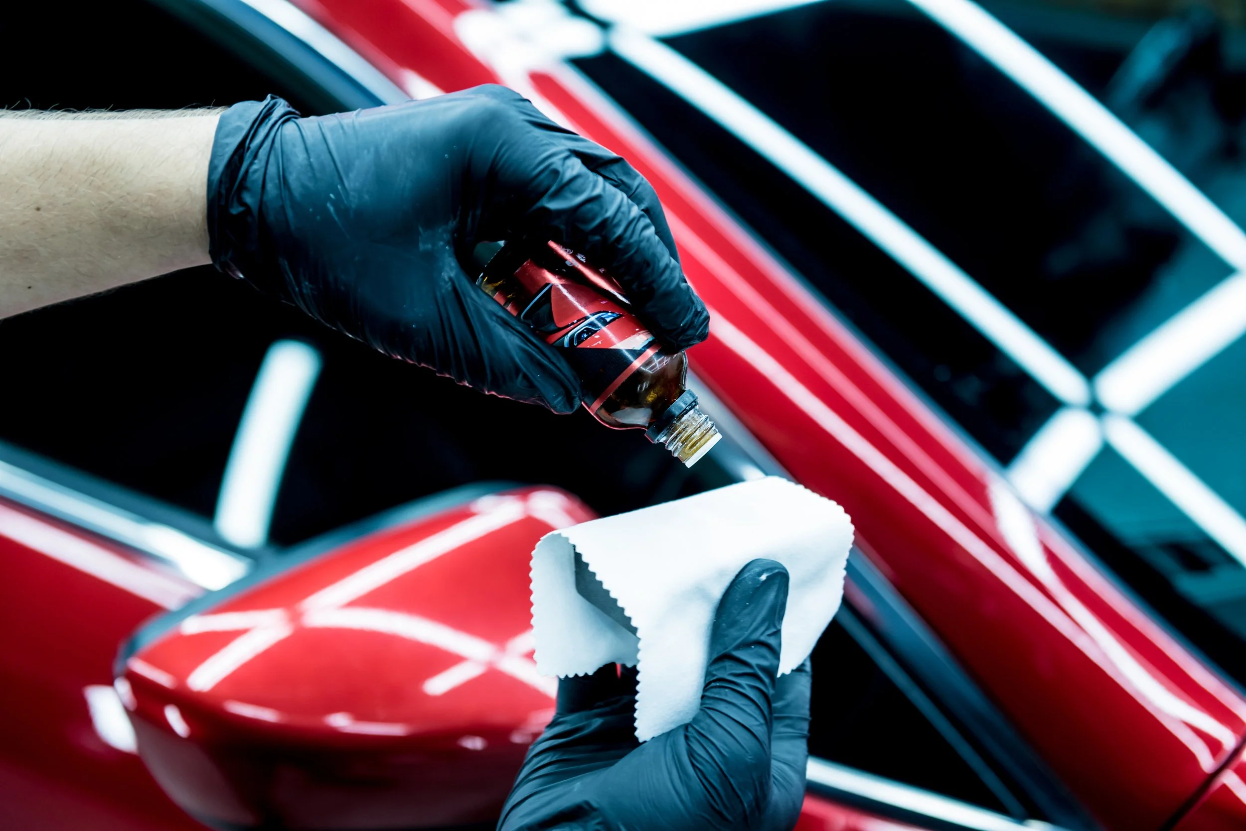 car-service-worker-applying-nano-coating-car.jpg