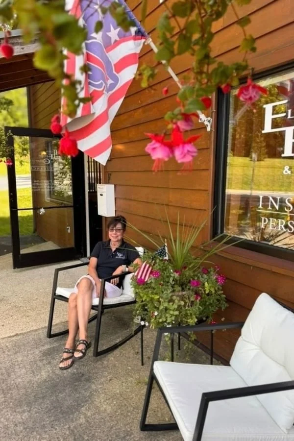 Ellen Fenton Sitting outside her office in Ellicottville, NY.