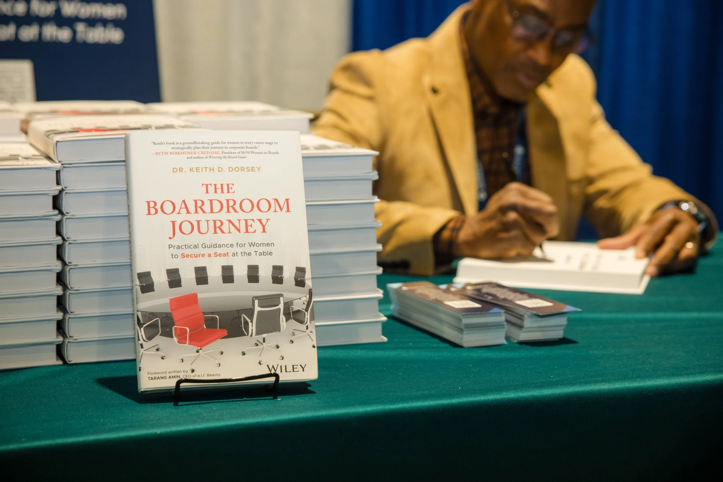 Dr. Keith D. Dorsey signing copies of The Boardroom Journey