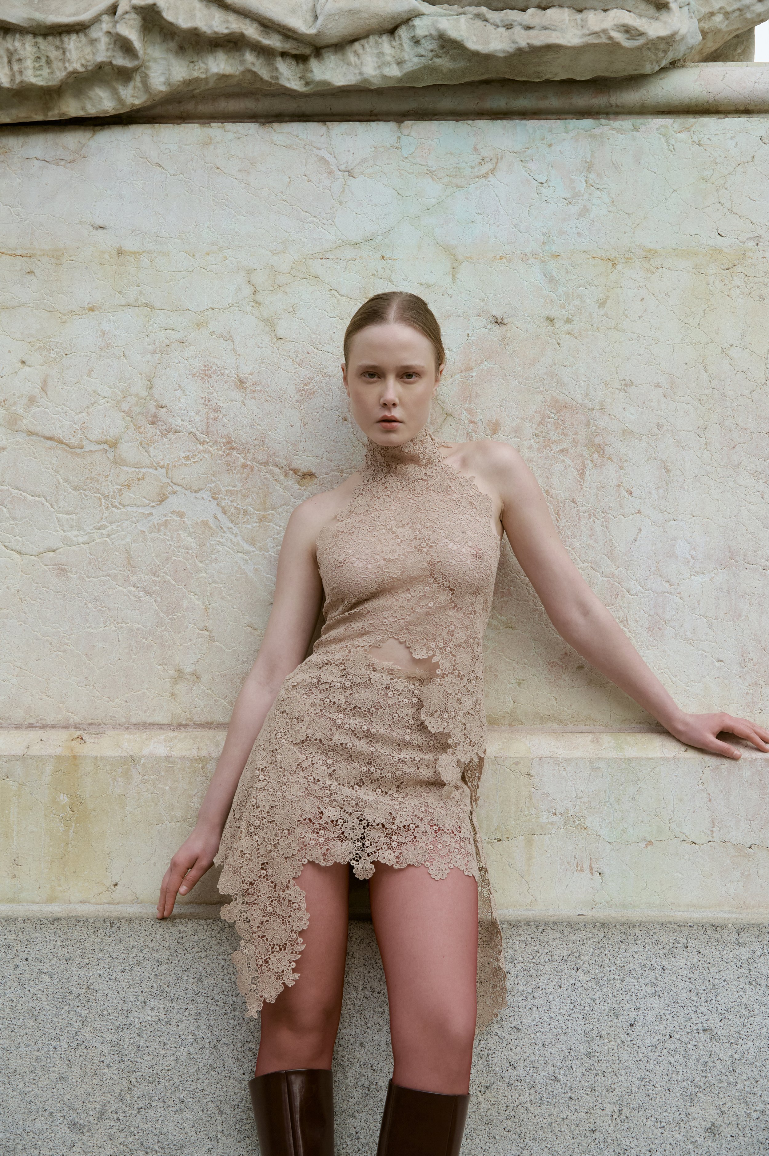 Elegant beige lace skirt with architectural drape, couture design