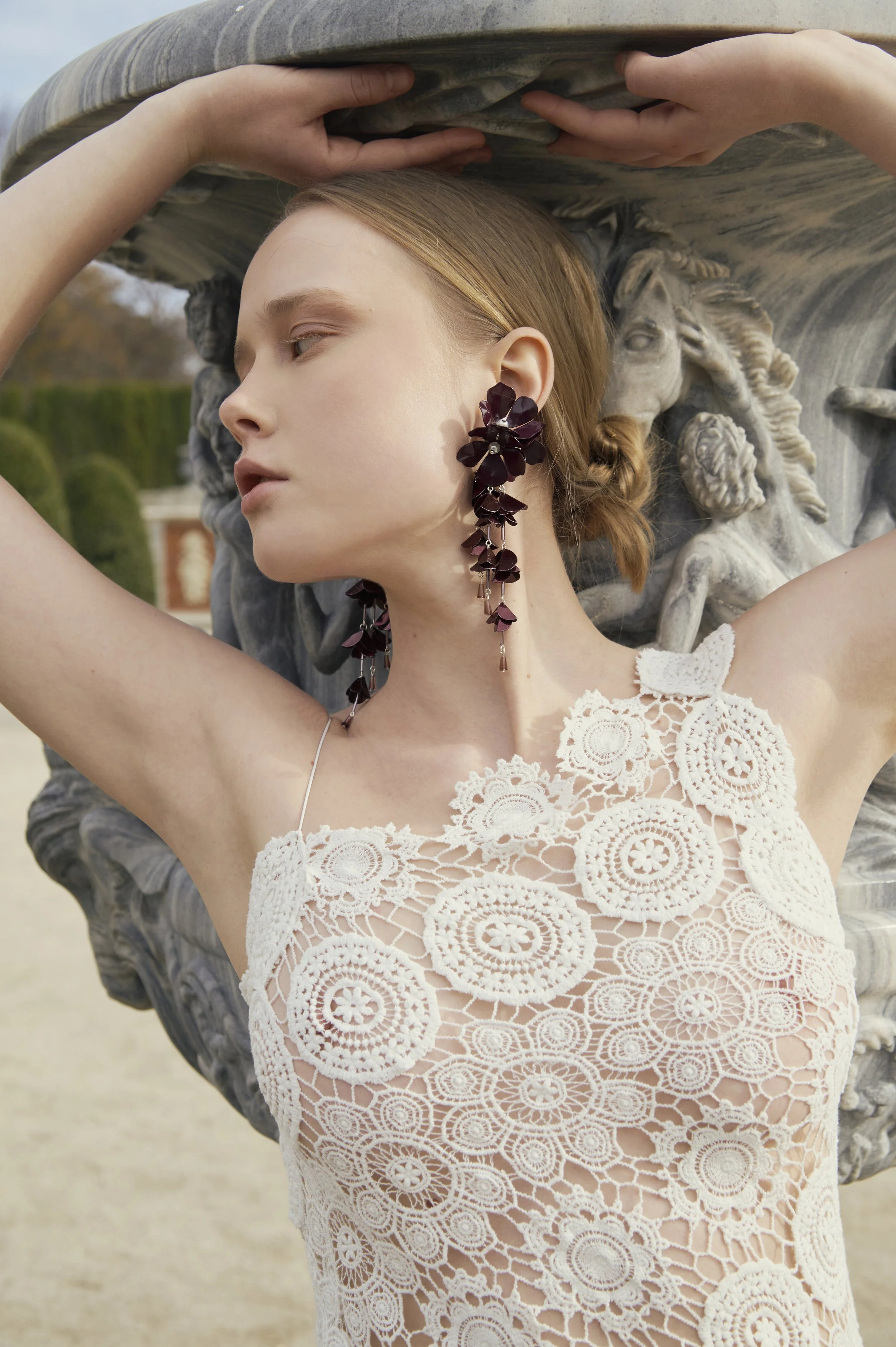 White crochet couture dress with sculptural handmade appliqués