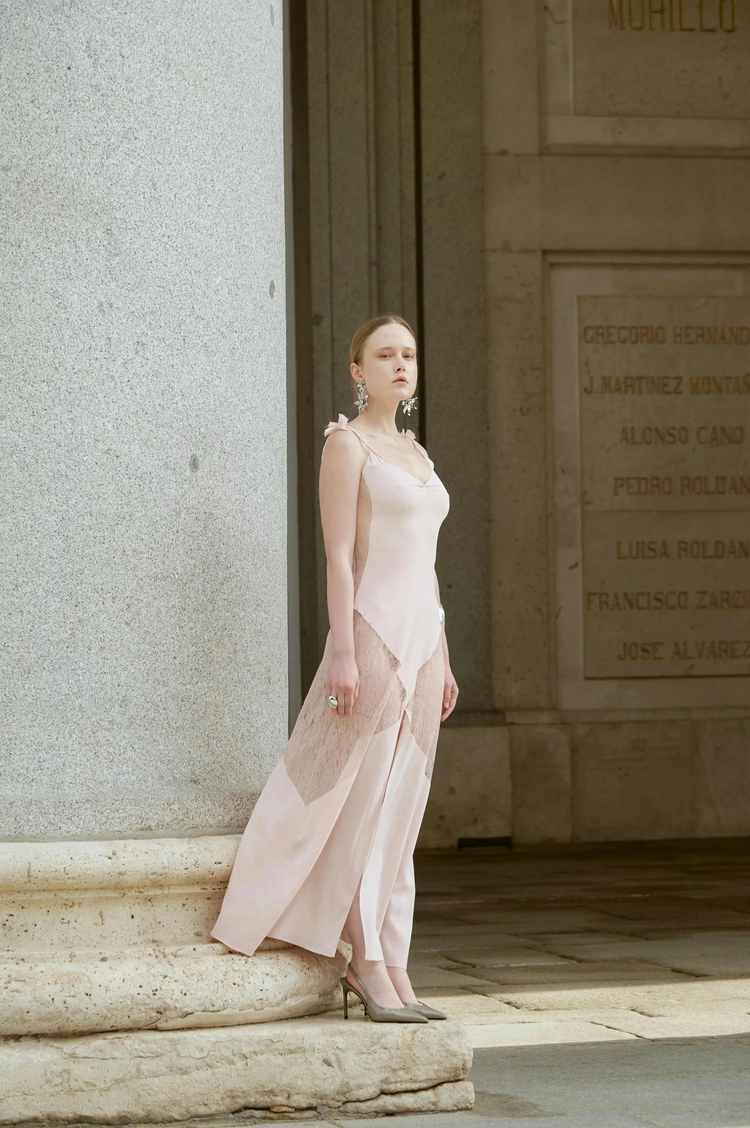 Luxury blush silk dress with fluid drape and elegant movement