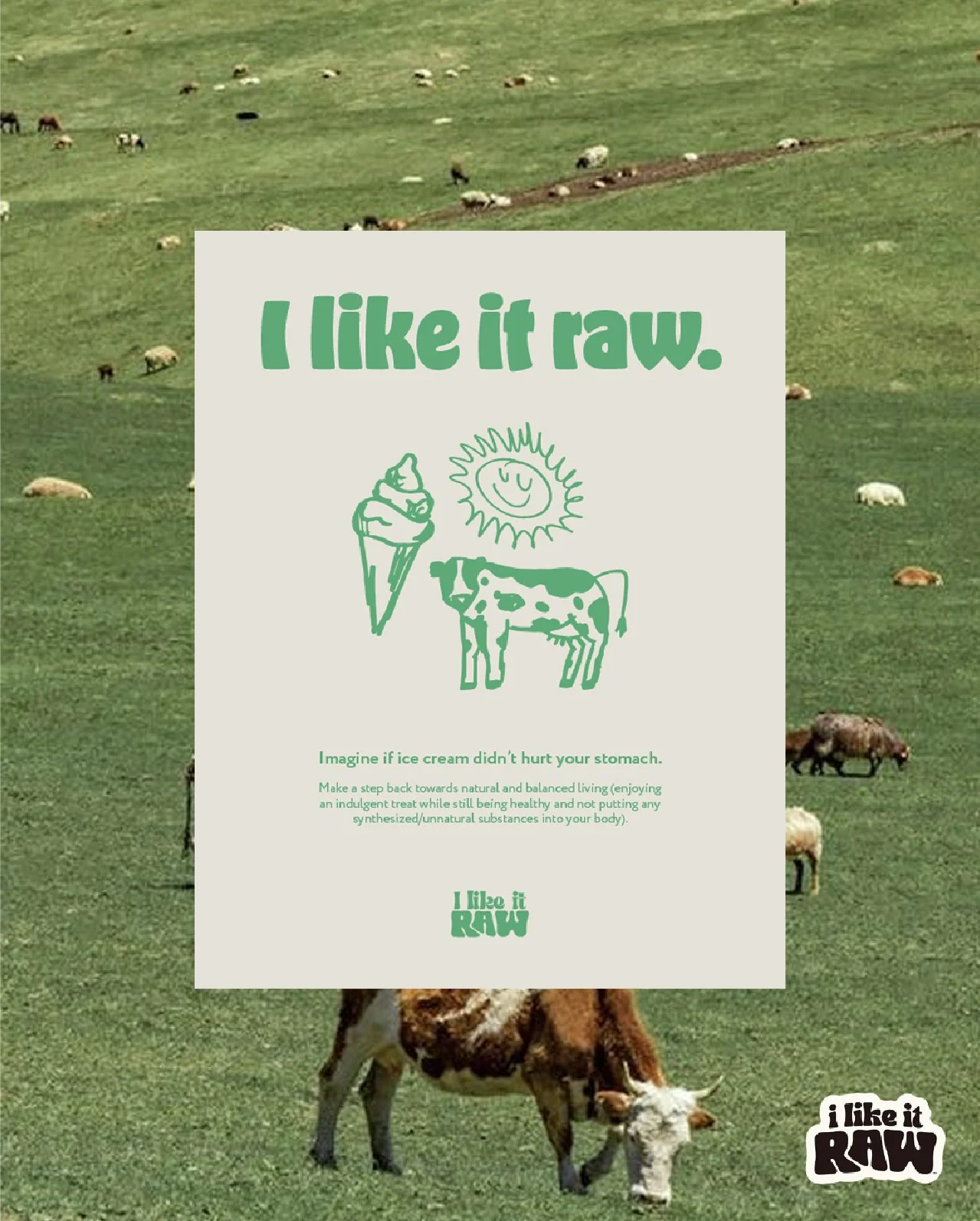A grassy pasture with grazing cows and a promotional poster in the center promoting raw, unprocessed food with text and simple illustrations of an ice cream cone, a sun, and a cow.