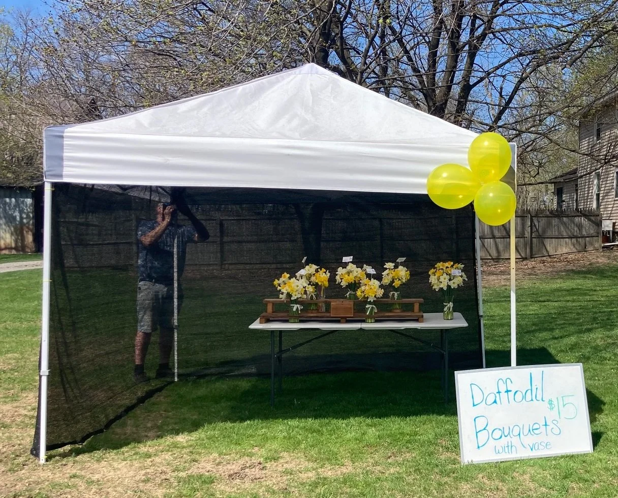 Spring 2023 - table under EZ up with shade cloth