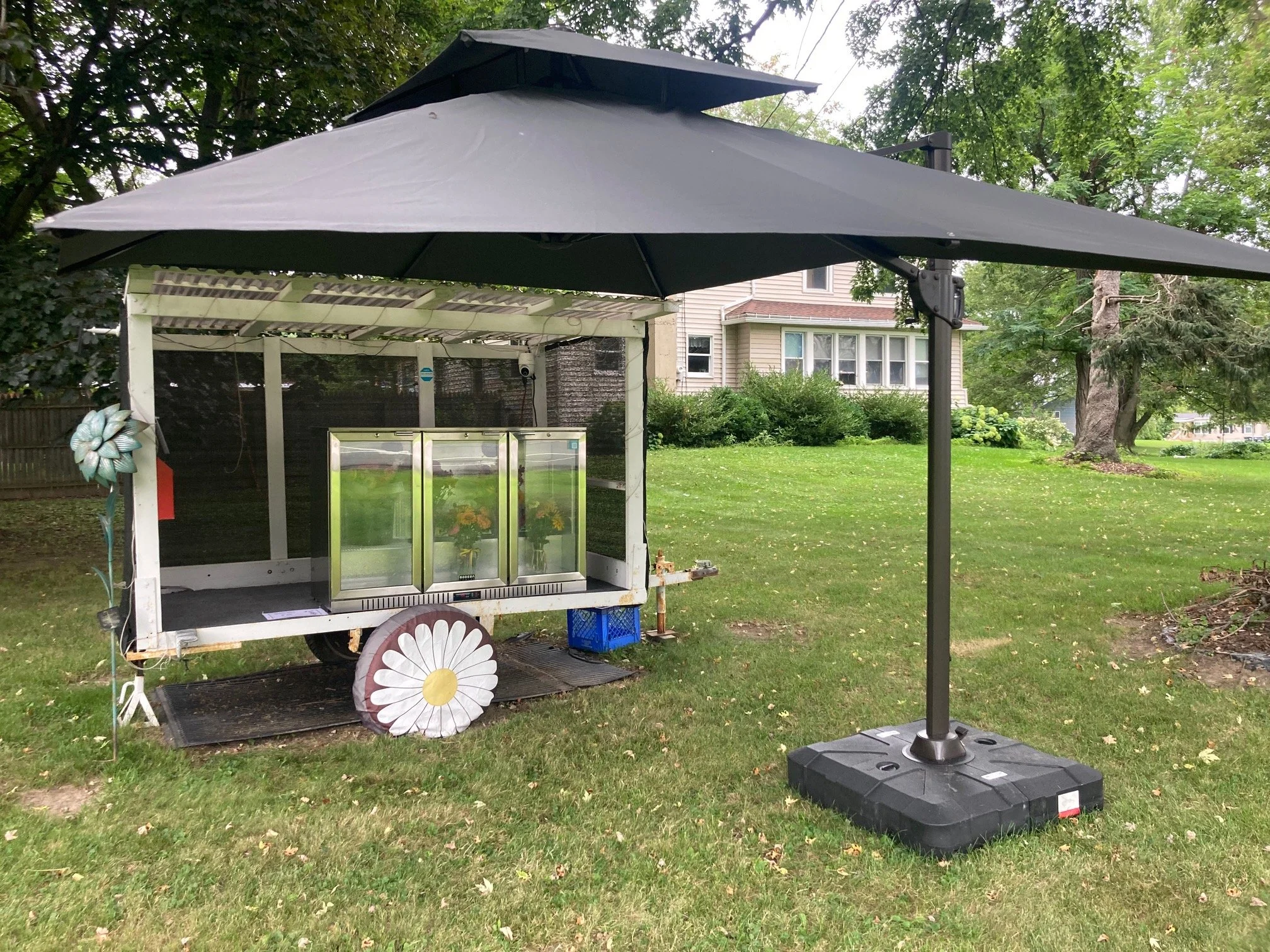 flower stand with cooler and umbrella