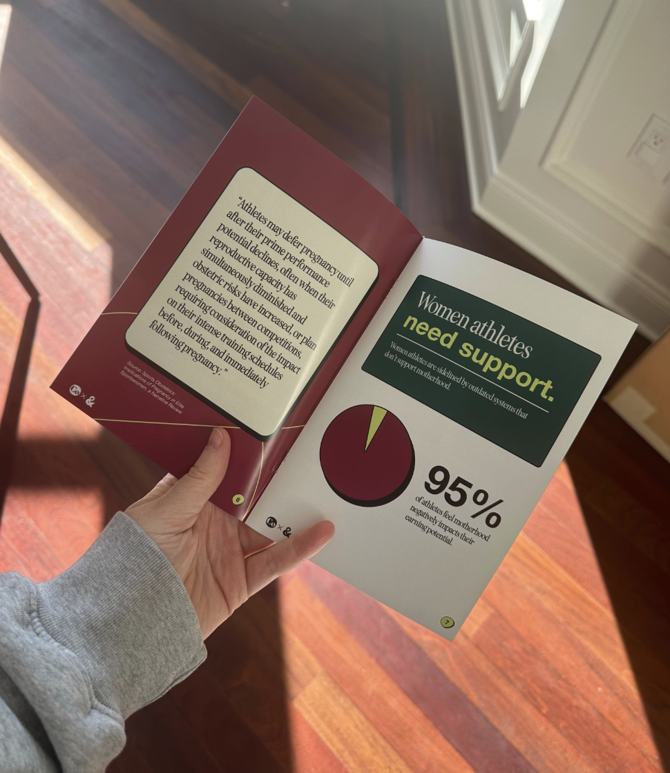 A woman displays the Level the Playing Field campaign informational pamphlet