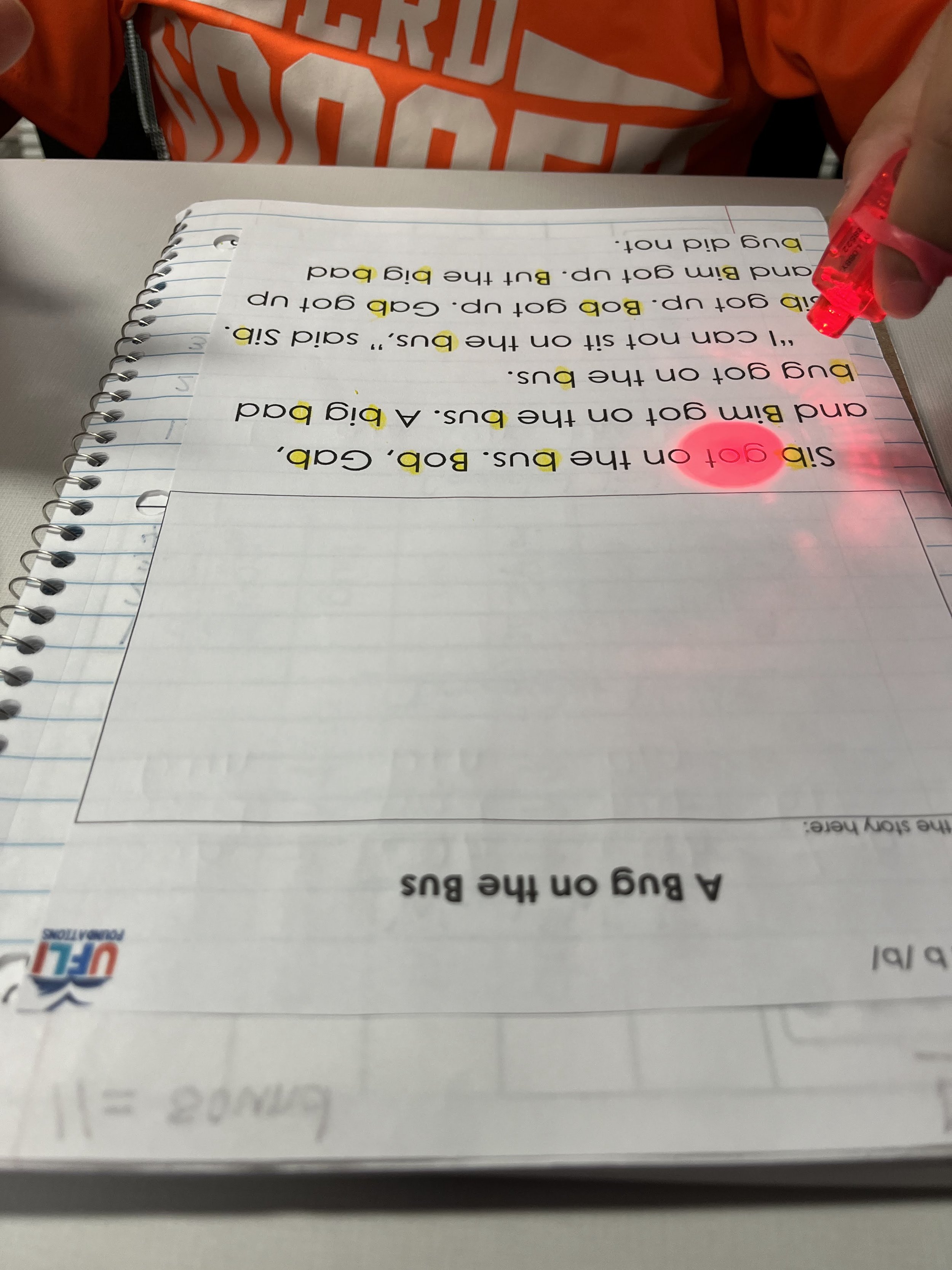 Child learning how to read with private reading tutor