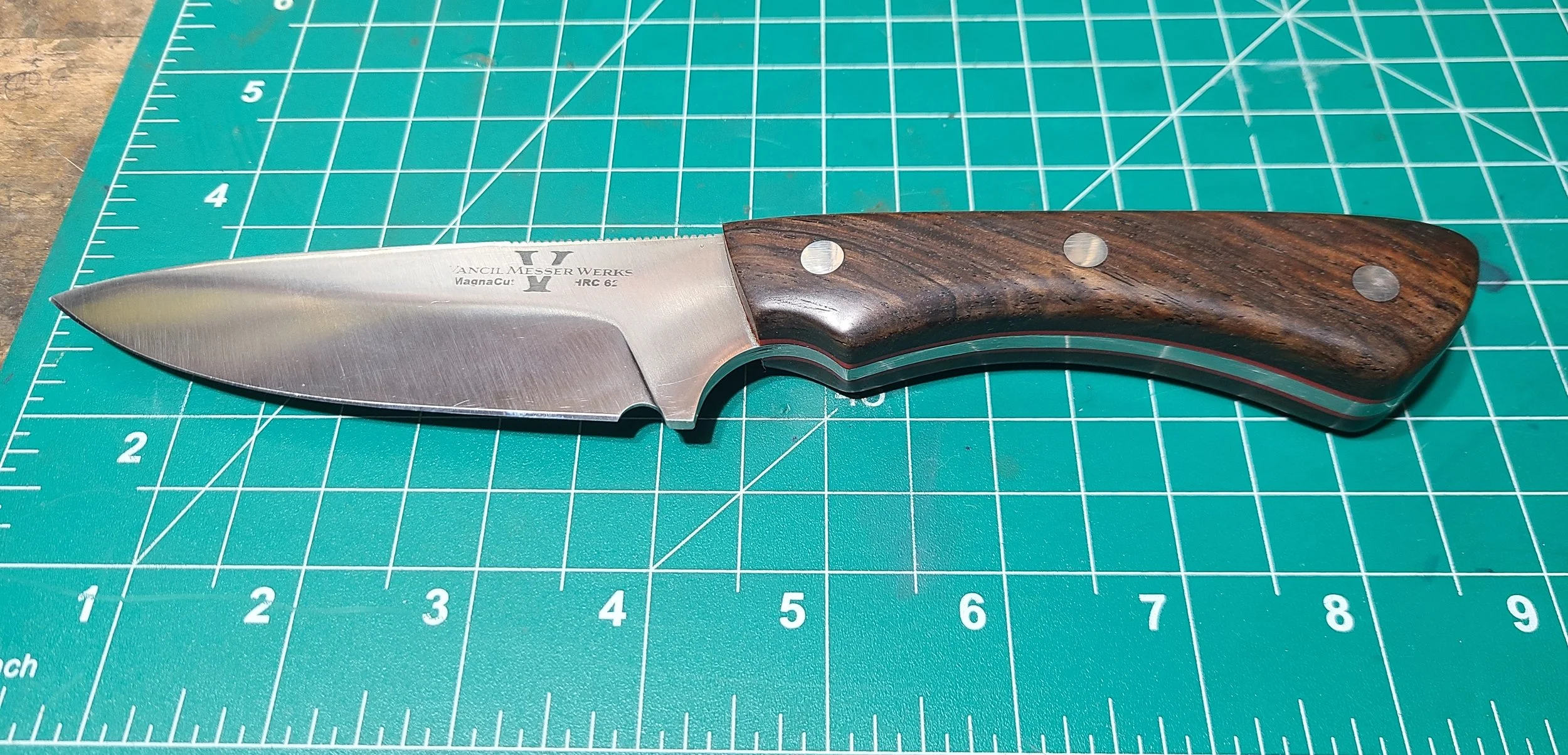 4" Drop point hunter dressed in Cocobolo wood with red G10 liners