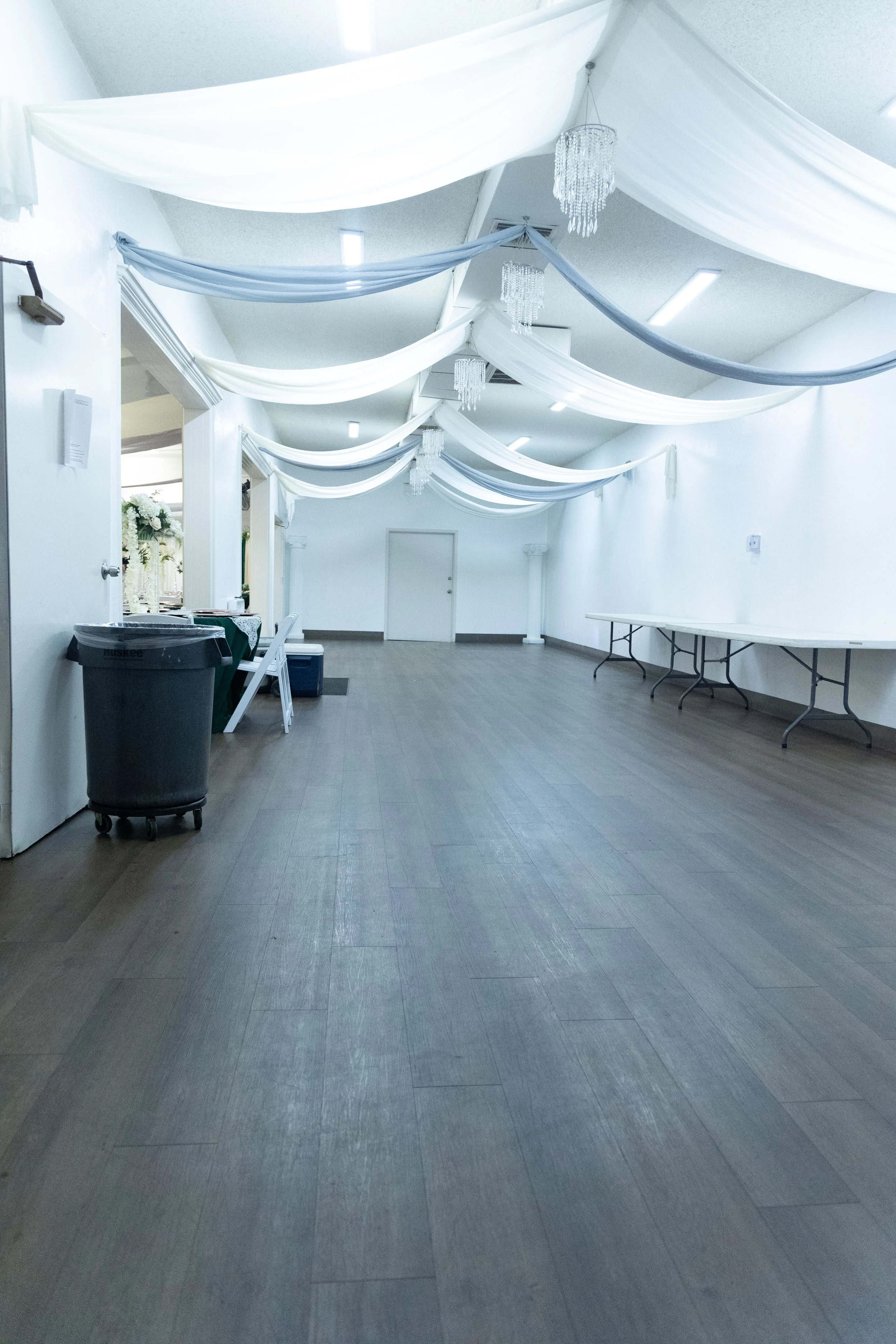 portrait-extended-event-space-and-vendor-area-kitchen-door-and view-from-back-exit-the-abg-fresno-the-abg-event-venue.jpg