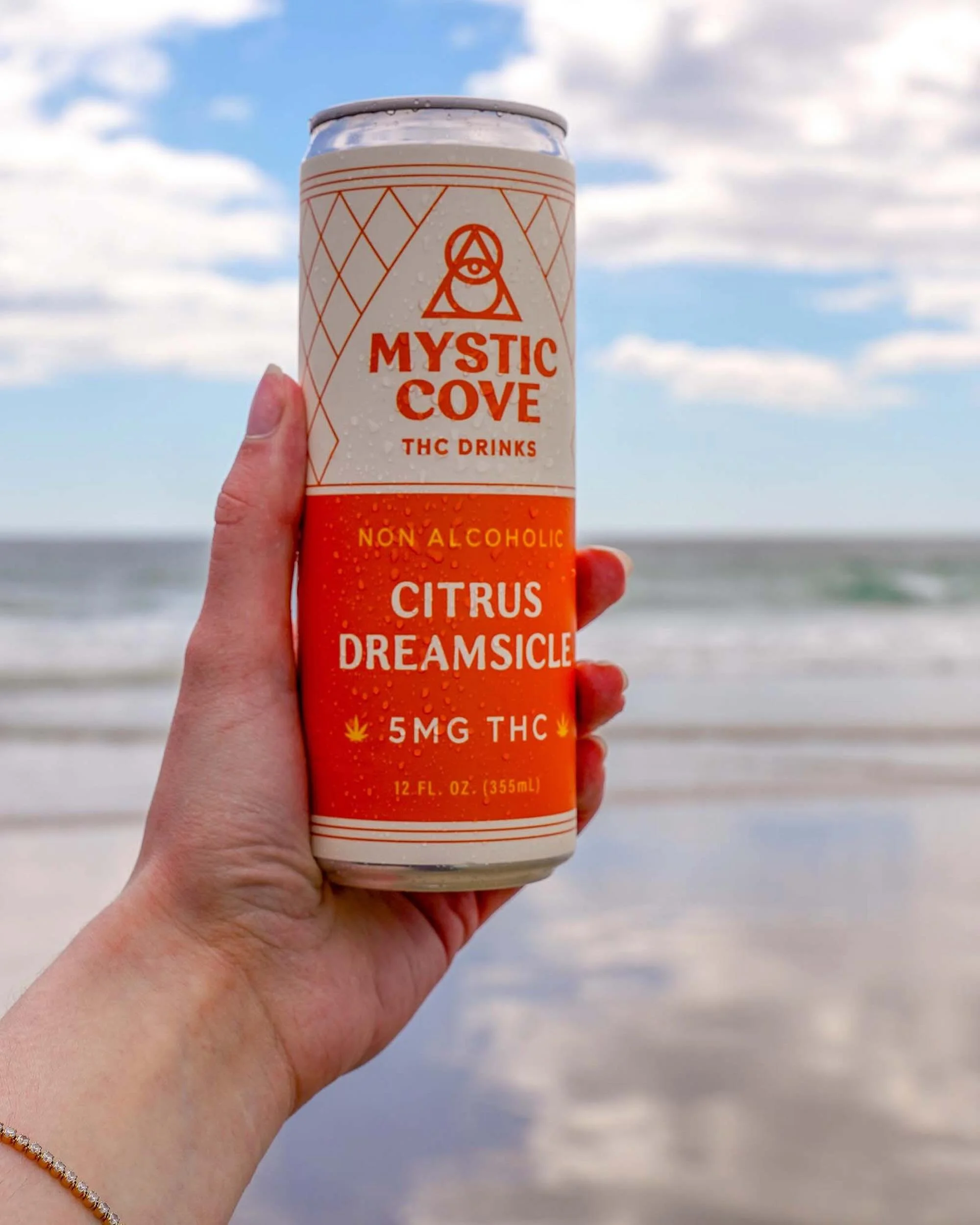 Dreamy. ✨Citrus Dreamsicle✨ is a blend of tangerine and lemon-lime sherbet flavors, mixed with 5mg of THC. 4pks available at all Sebago locations or order online at mysticcovedrinks.com