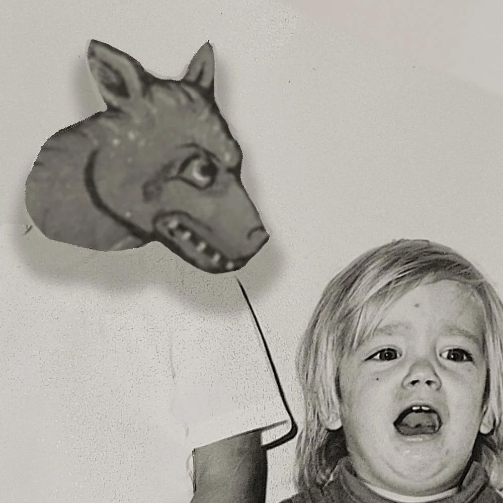 Black and white photo of two children. The smaller one appears afraid and the taller one has a dog's head photoshopped onto him.