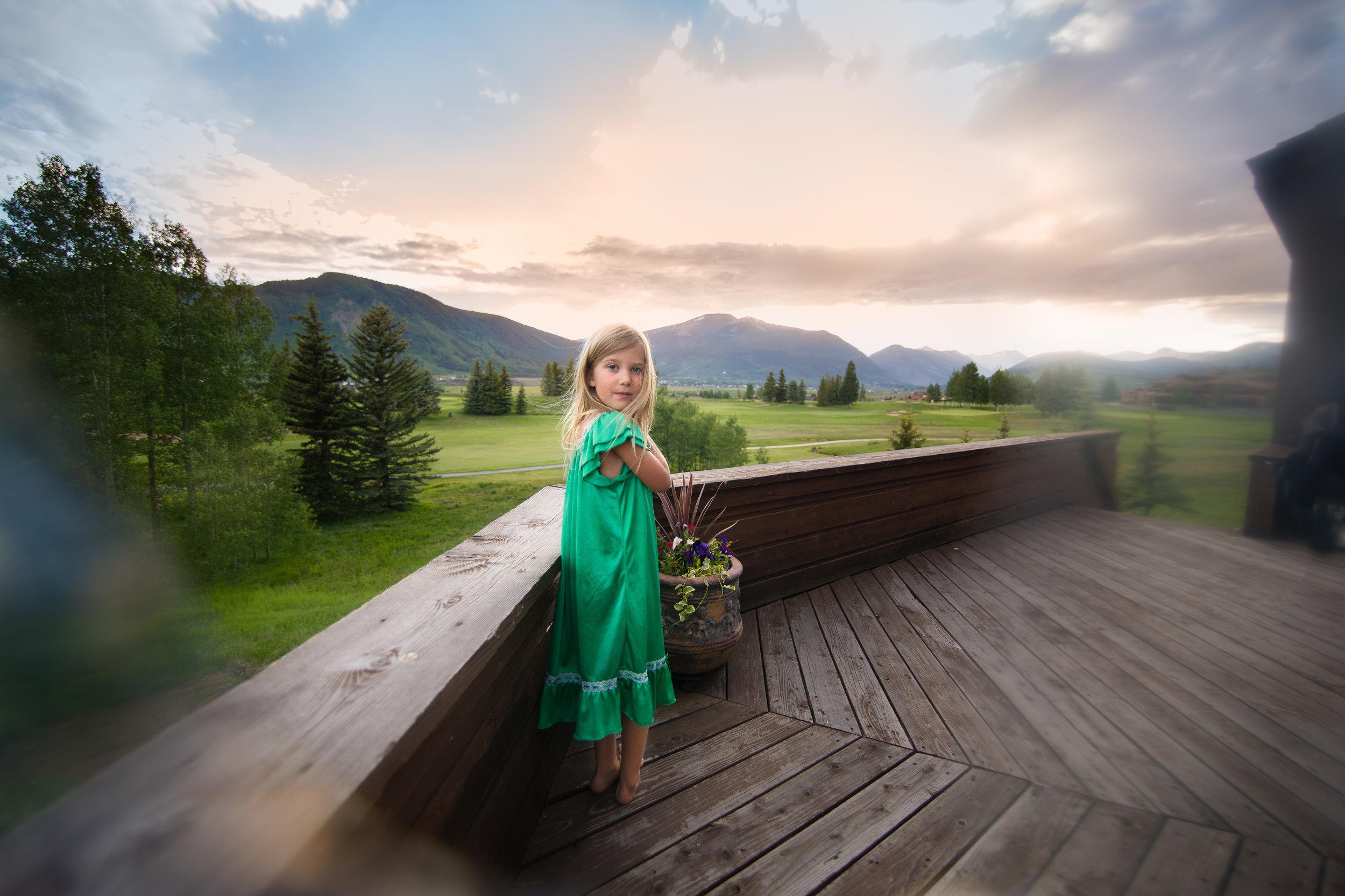Creative-documentary-photograph-standing-on-a-porch-in-Crested-Butte-Colorado.jpg