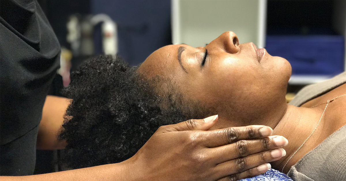 Lady receiving Reiki