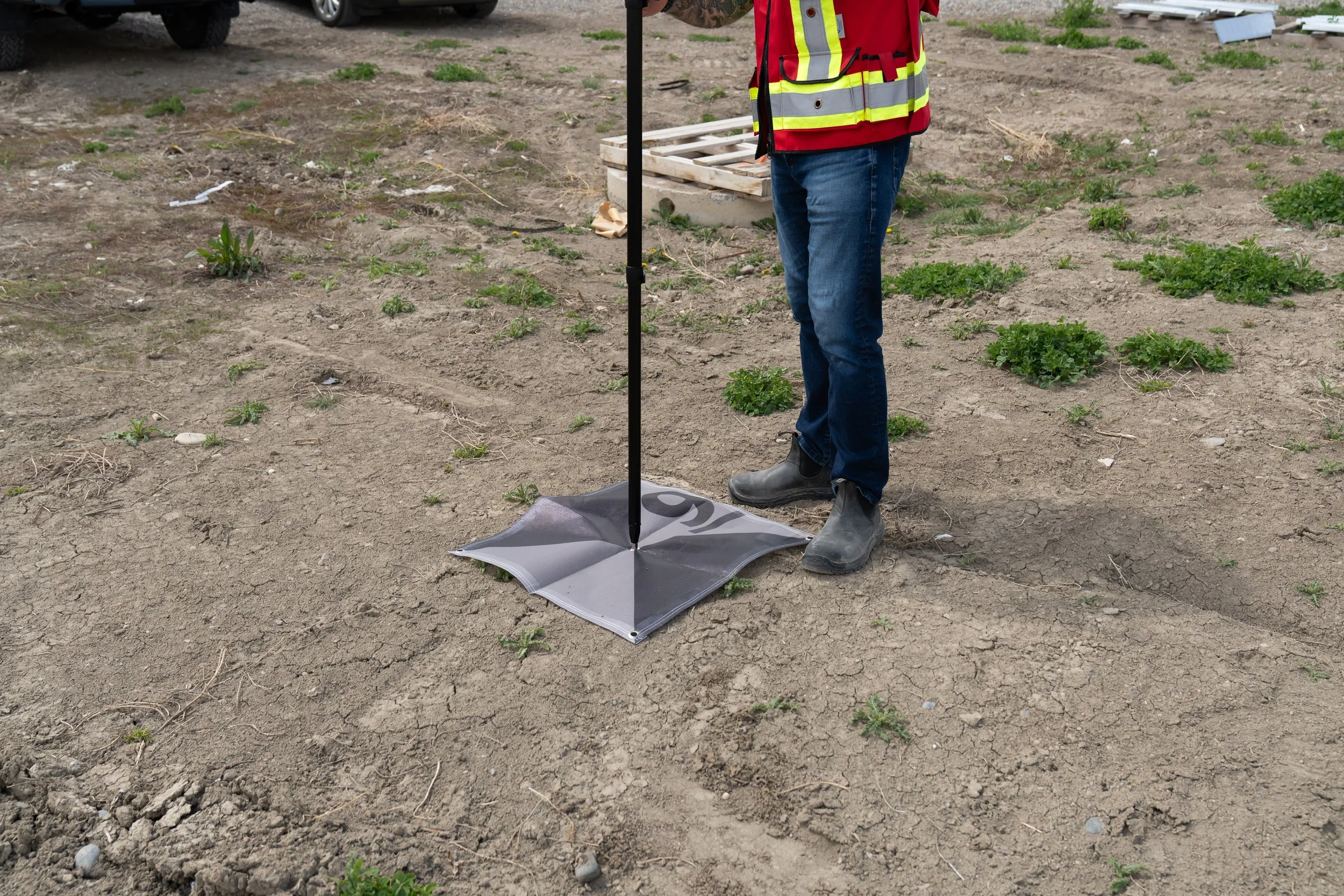 A ground-control target being measured by precise GNSS hardware for use in 'ground truthing' an aerial capture.