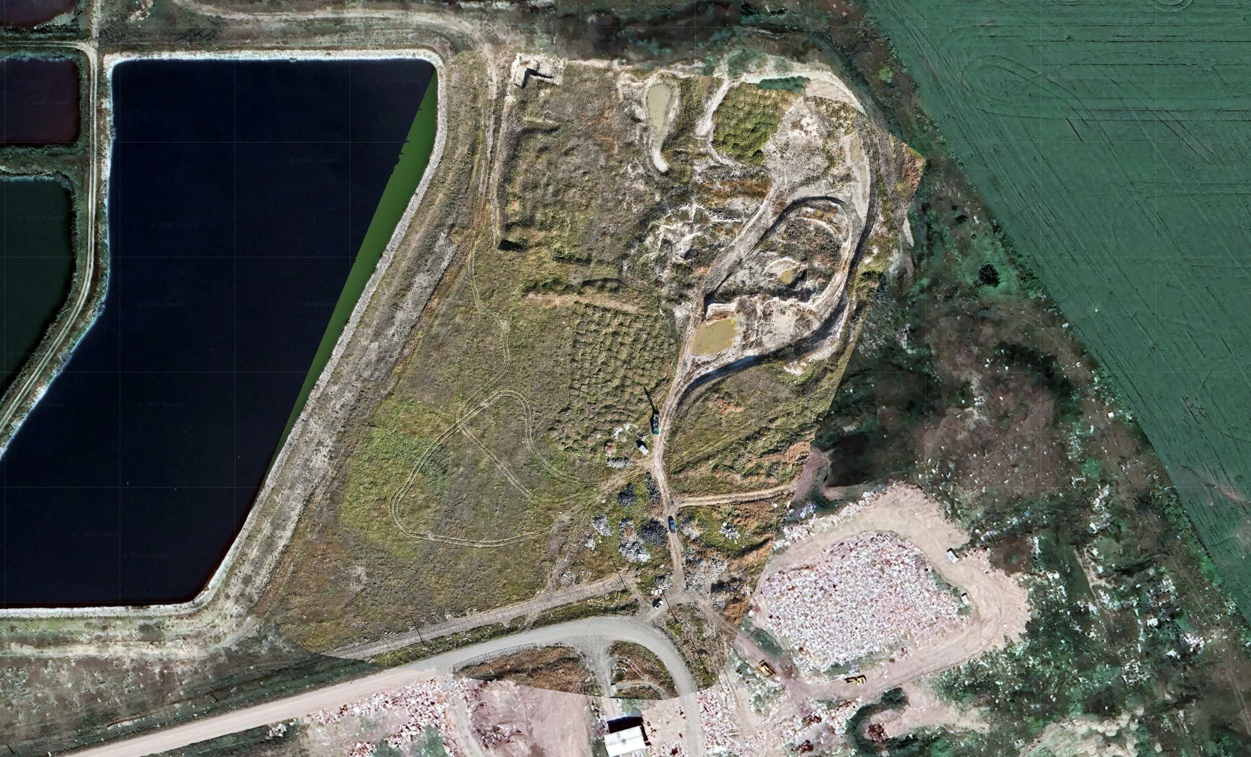 High-resolution aerial orthomosaic map of a future borrow pit site showing centimeter-level detail for project planning.