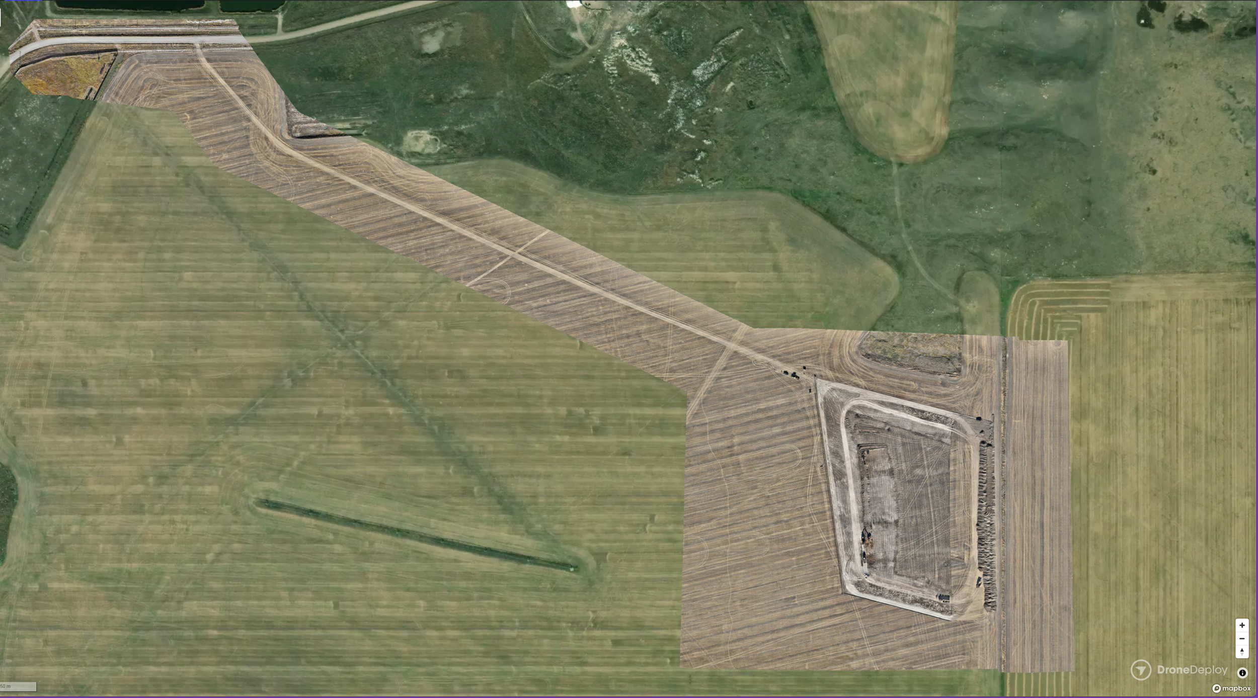 An orthophoto of an active borrow pit site and haul route