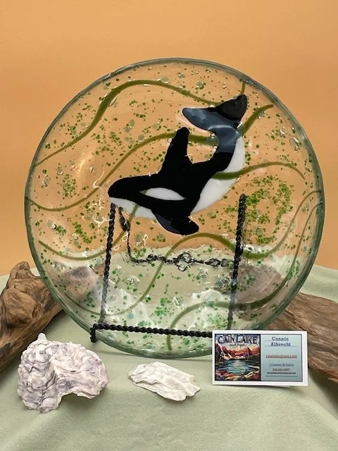 Large whale pasta bowl with green seaweed