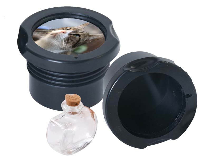The Memory Capsule is a personalized keepsake that holds a small amount of ashes or mementos, fitting securely into the base of the figurine urn