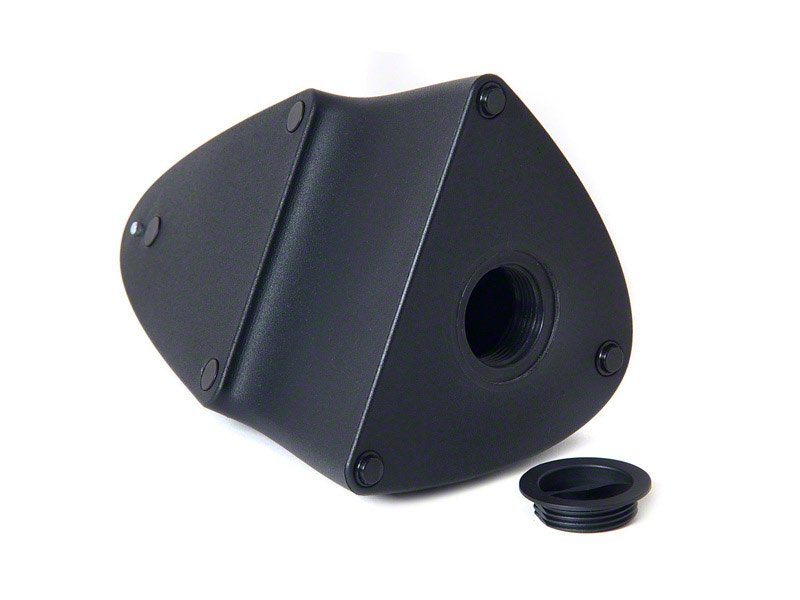 The ashes Pod, with its smoothly curving lines and dark matte textured finish, is pleasing to the eye, yet barely noticeable behind the picture frame it supports.