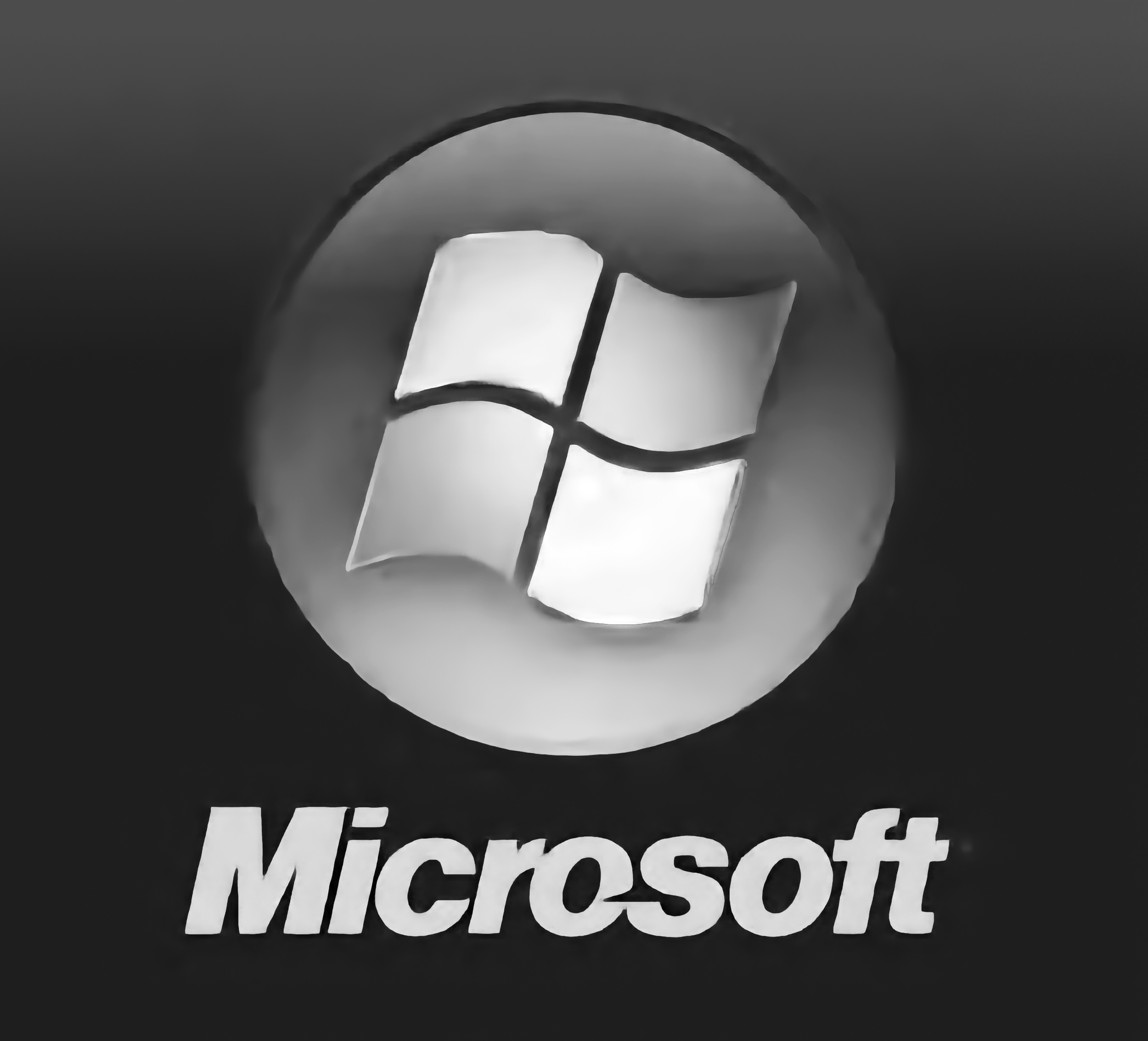 Black and white image of a circular logo with a stylized Windows symbol at the top and the word 'Microsoft' written below.