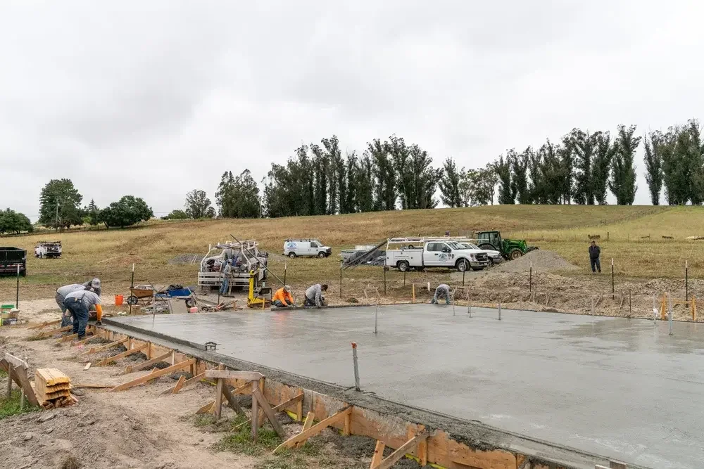 A dirt field with a lot of dirt and a lot of people