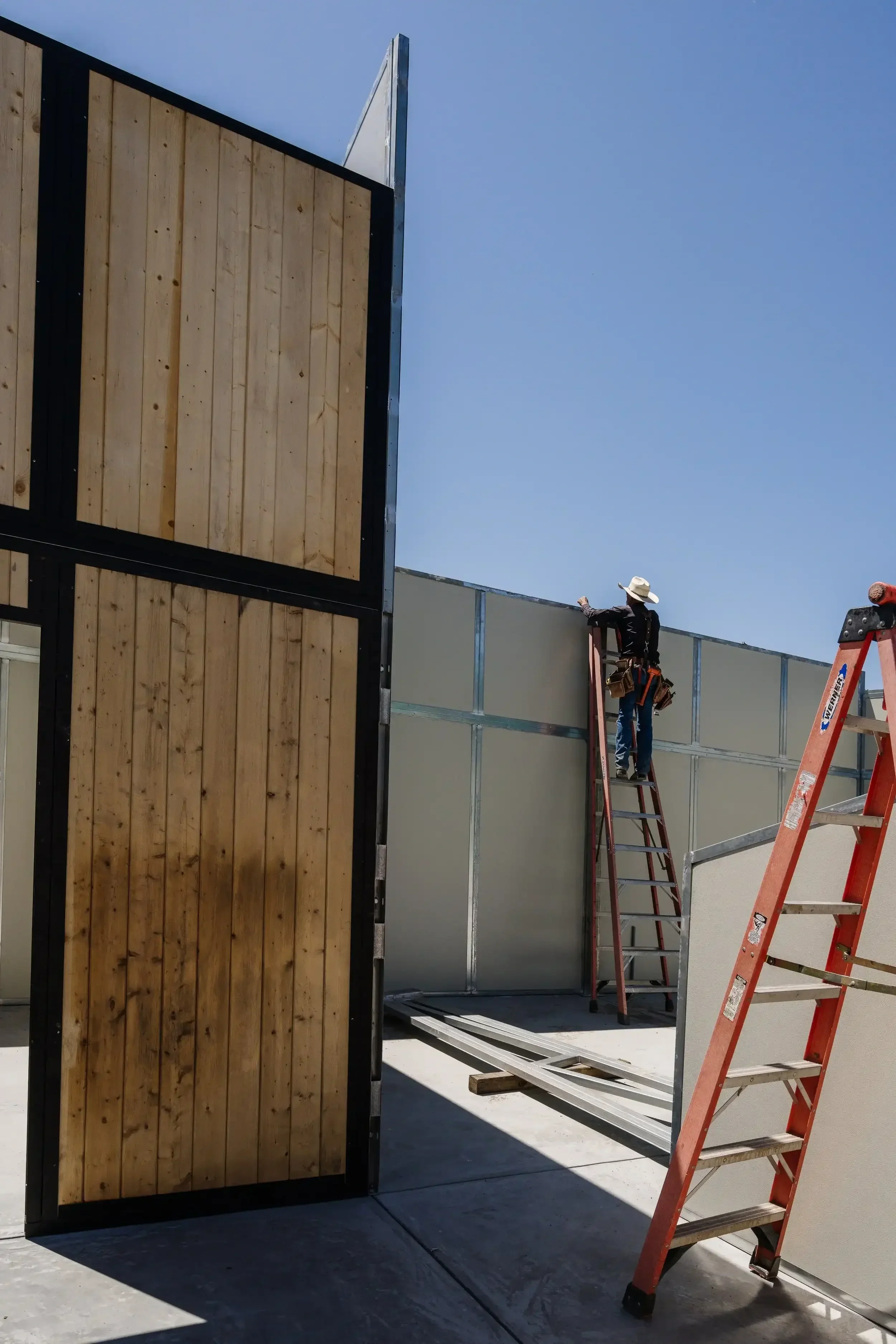 a-man-is-standing-on-a-cement-block.webp