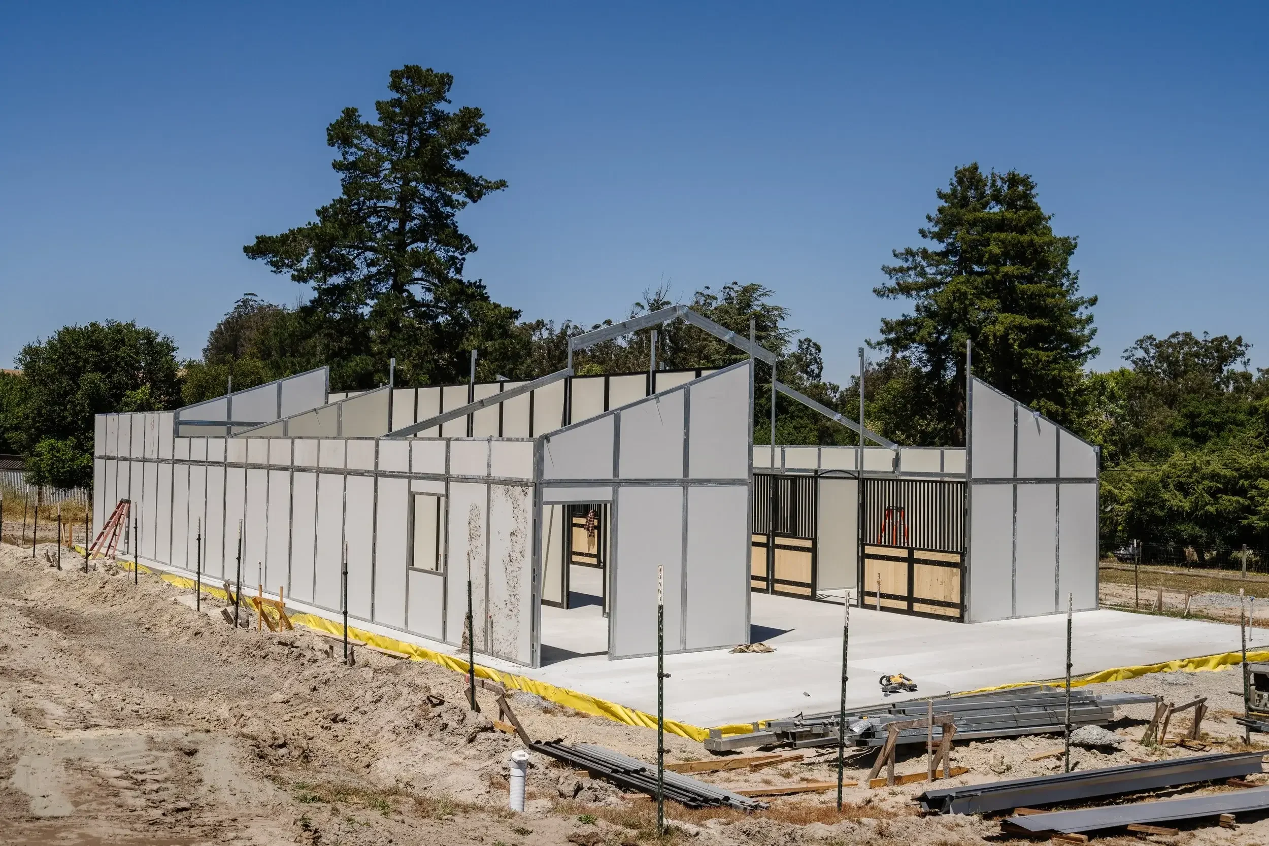 A white building with ongoing construction