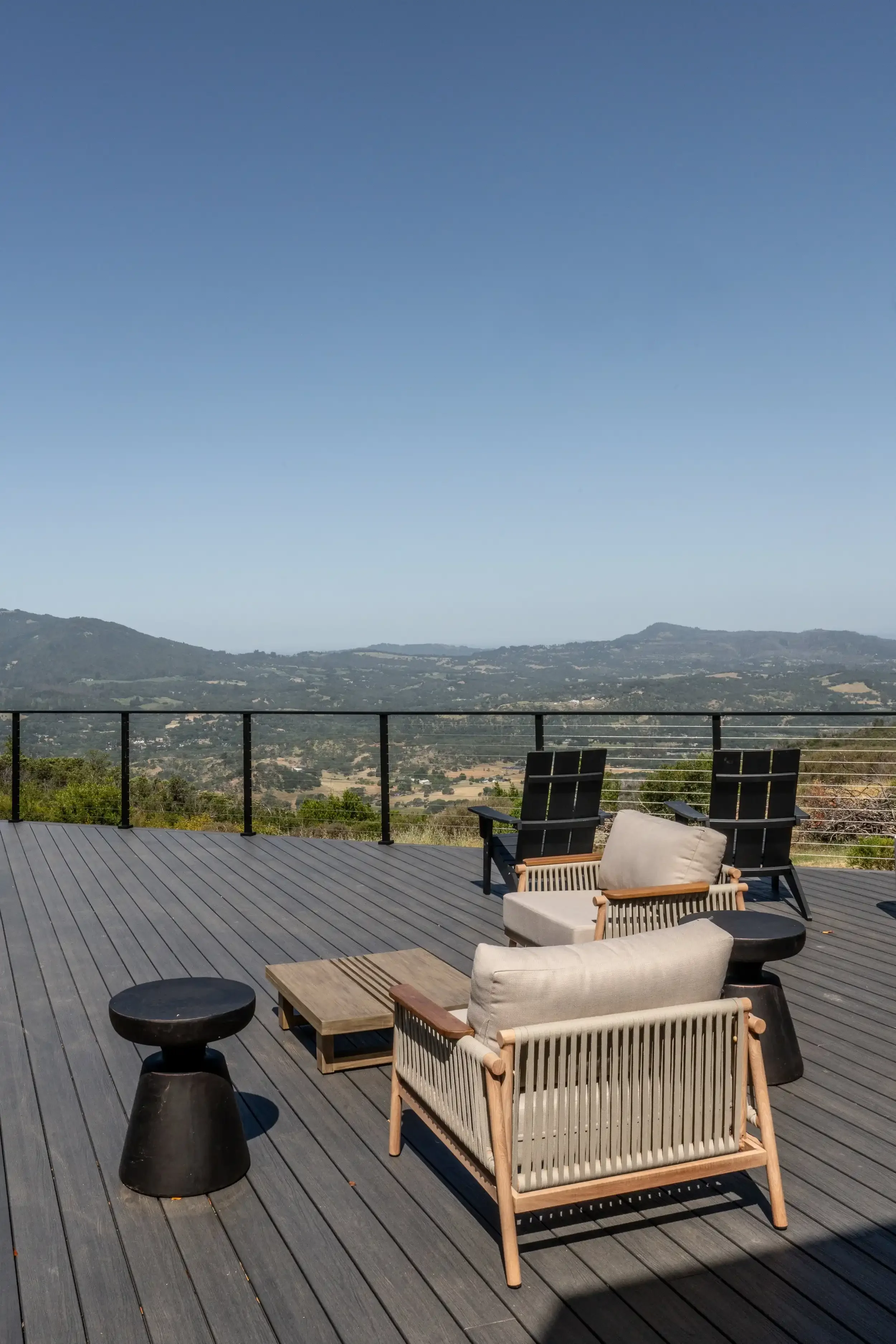 a-wooden-bench-sitting-on-top-of-a-wooden-deck.webp