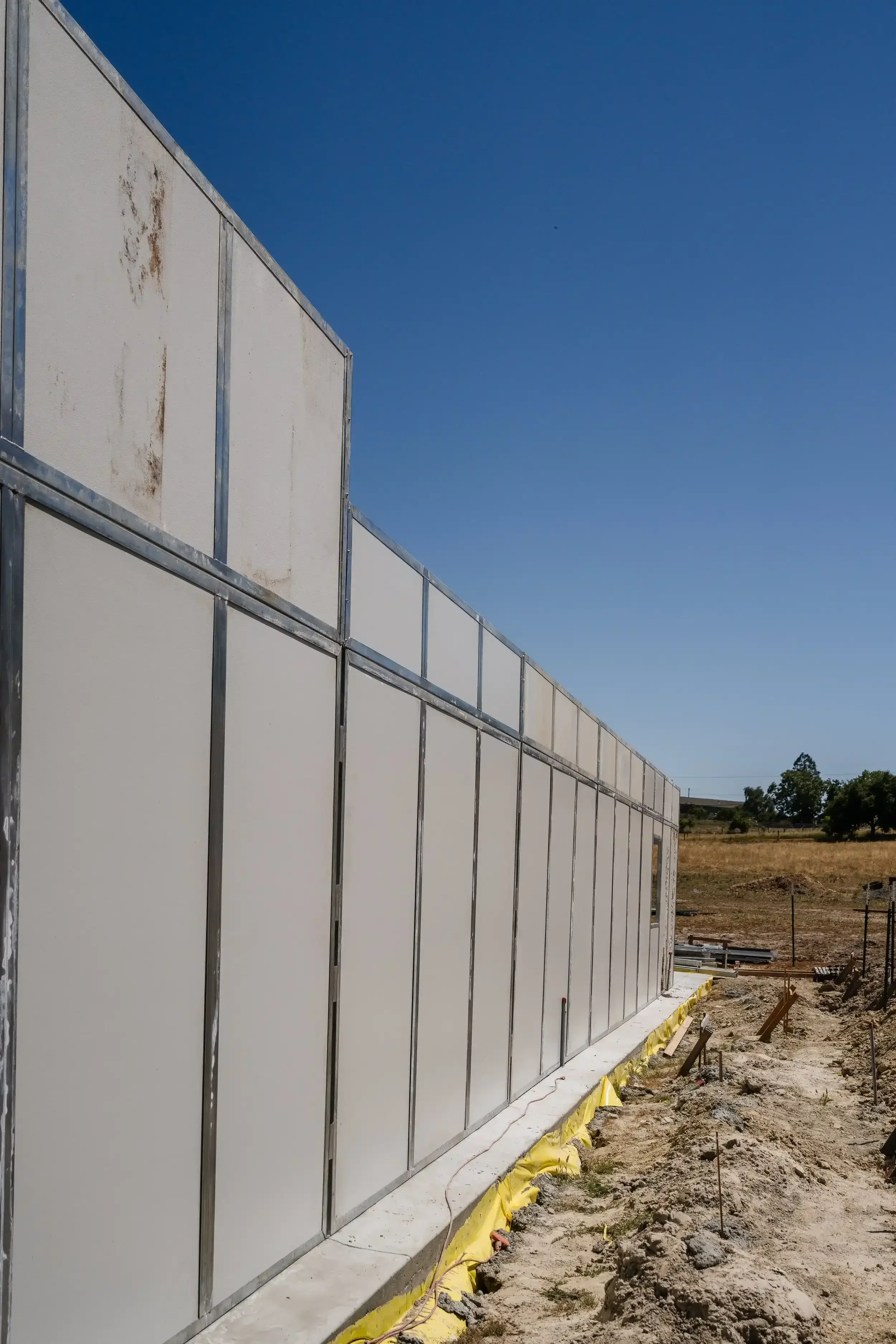 A fence that is covered with a white fence