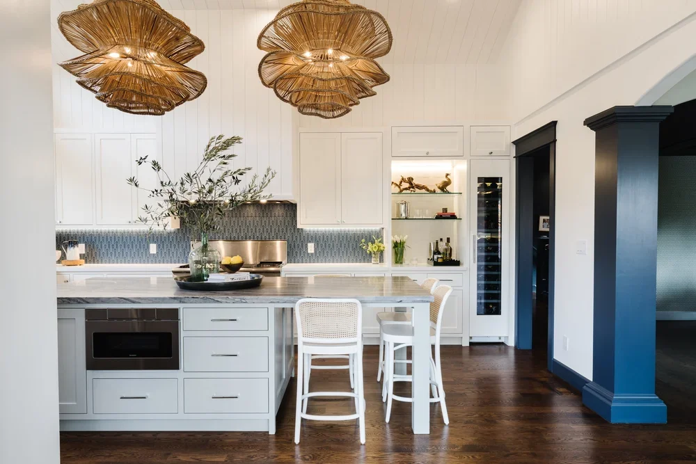 A kitchen with a white counter.webp