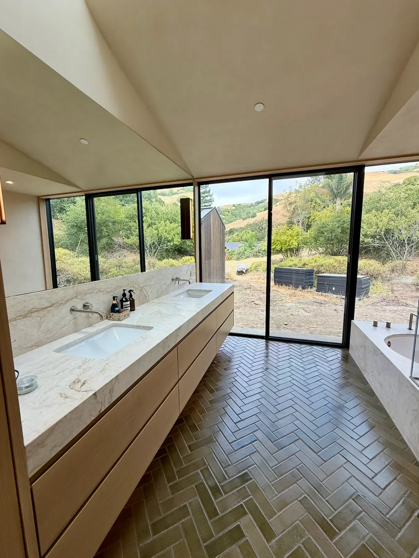 a-large-white-bath-tub-sitting-in-a-room