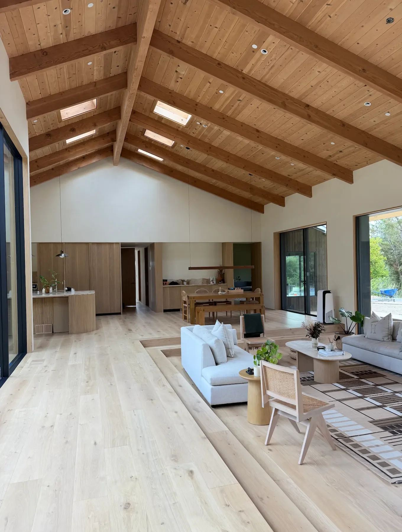 a-large-room-with-a-large-wooden-floor