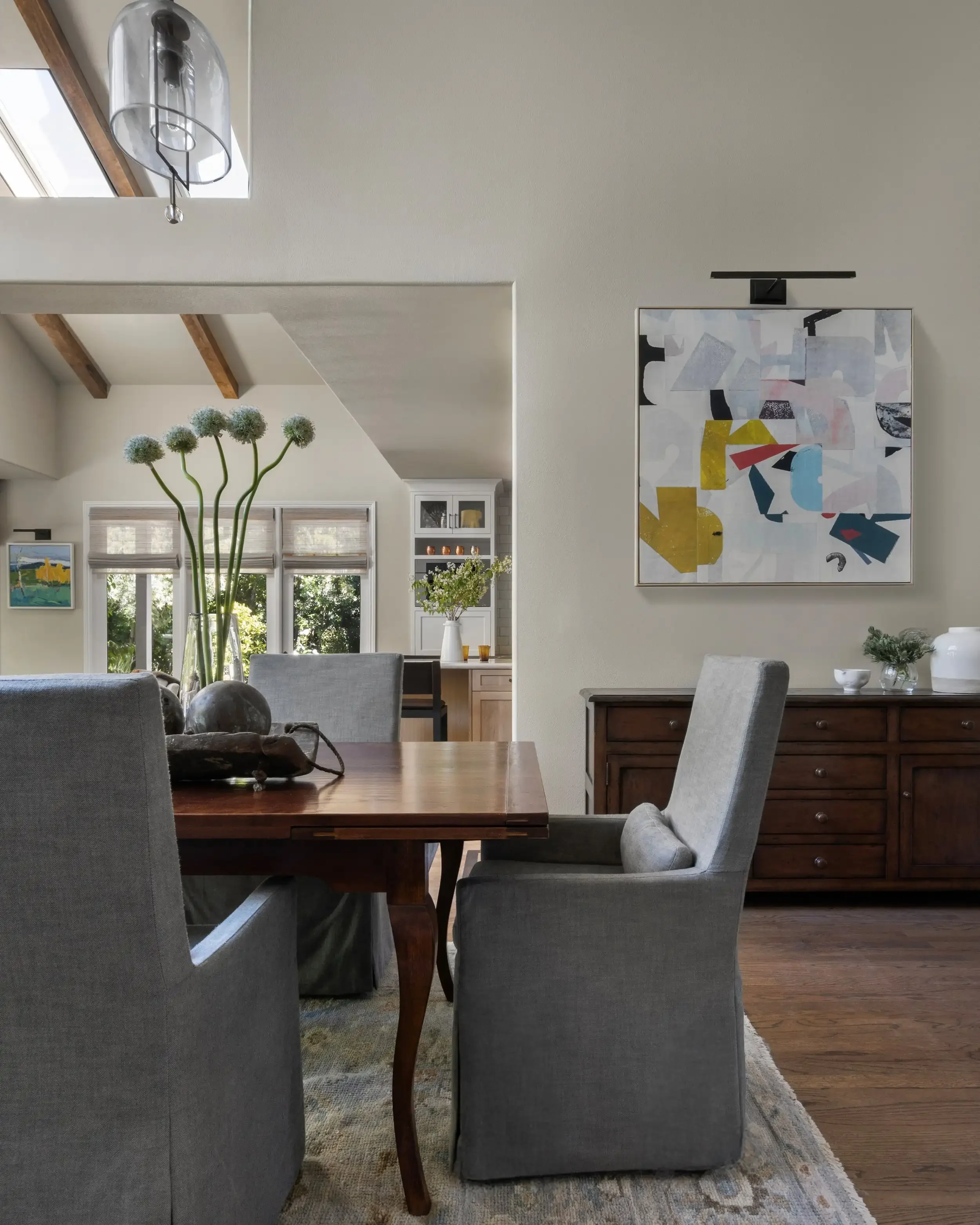 a-living-room-with-a-table-and-chairs.webp