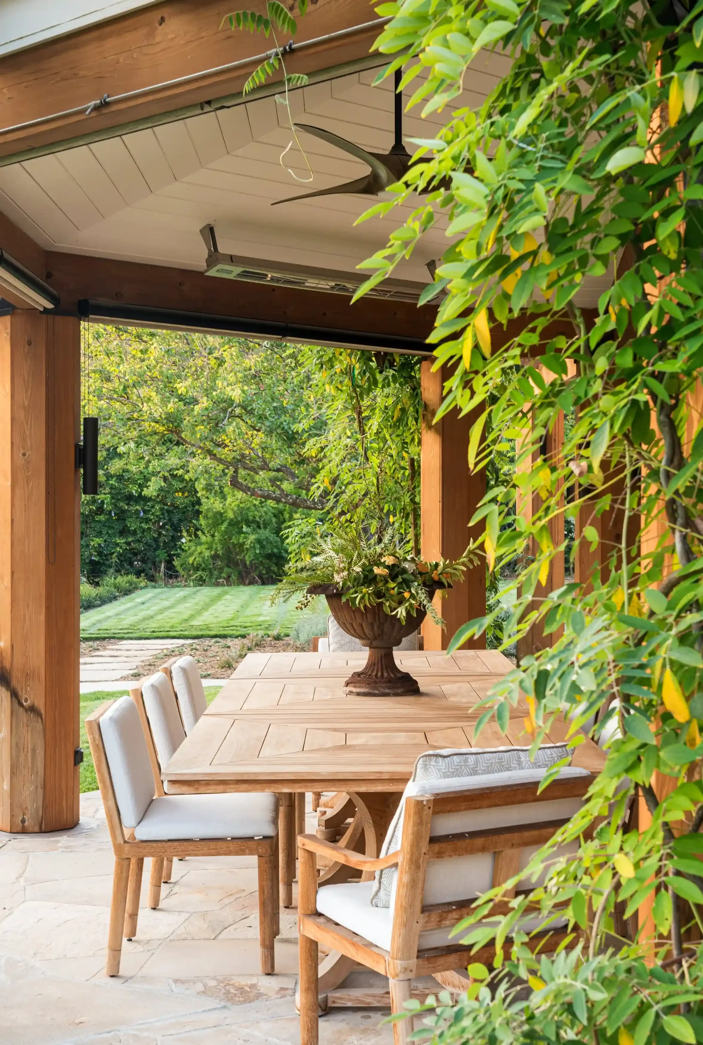 a-table-with-a-wooden-table-and-a-patio-area.webp